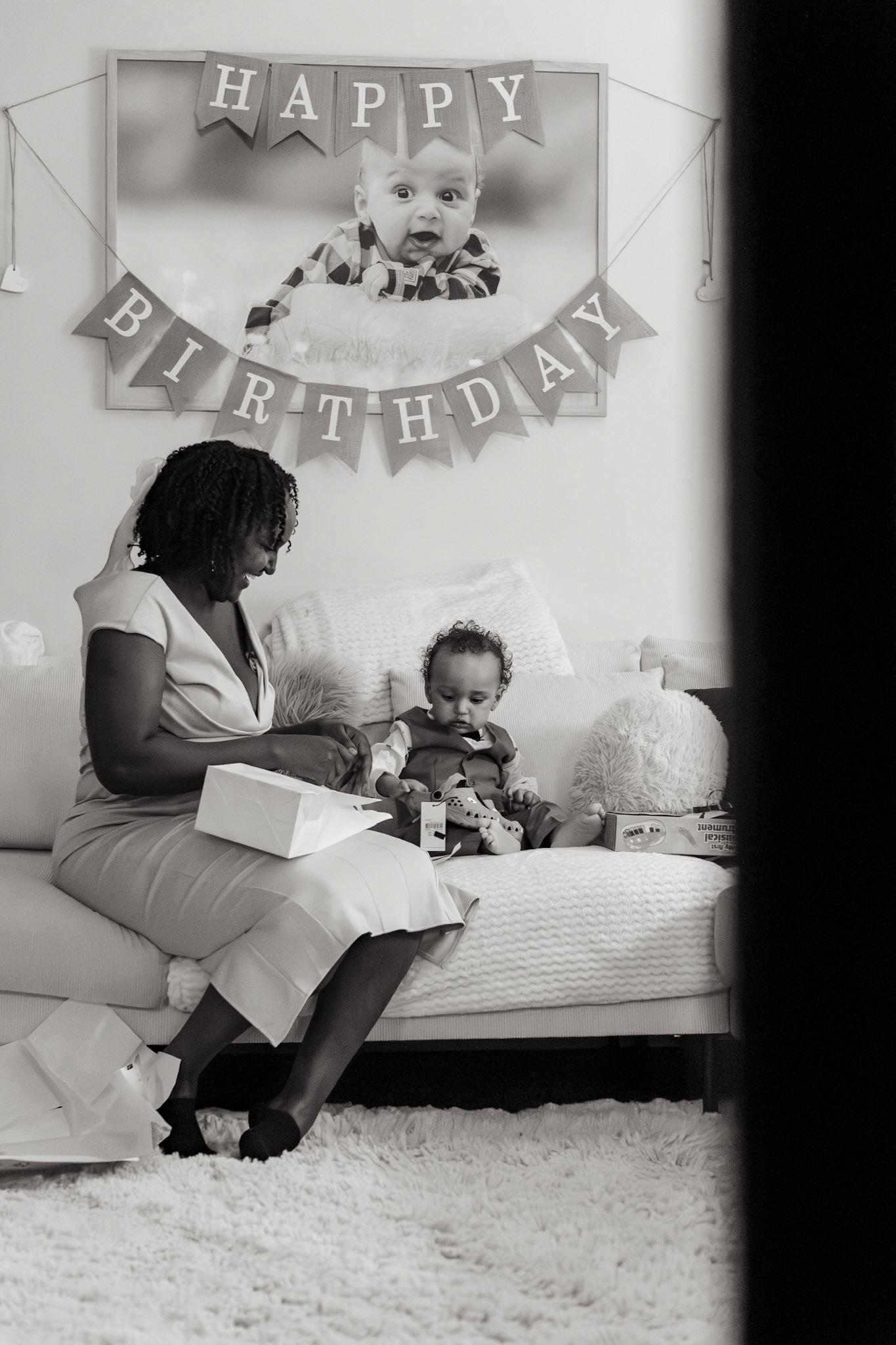 Mother and son opening presents