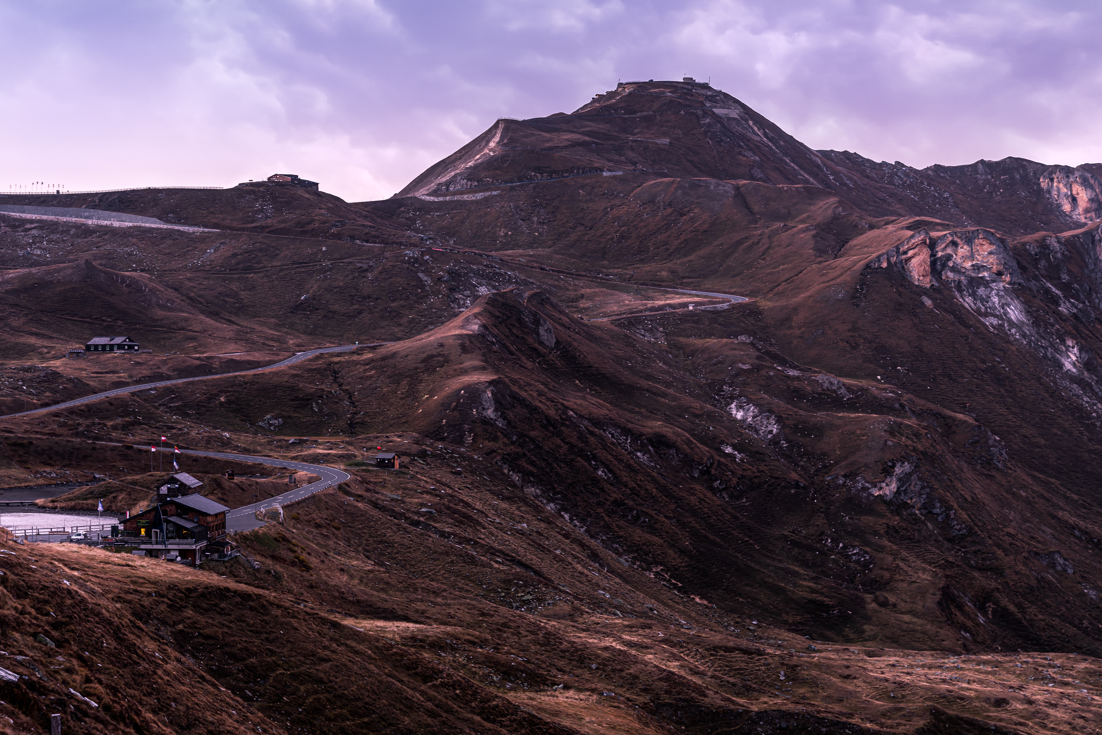 Winding Alpine Road after sunset