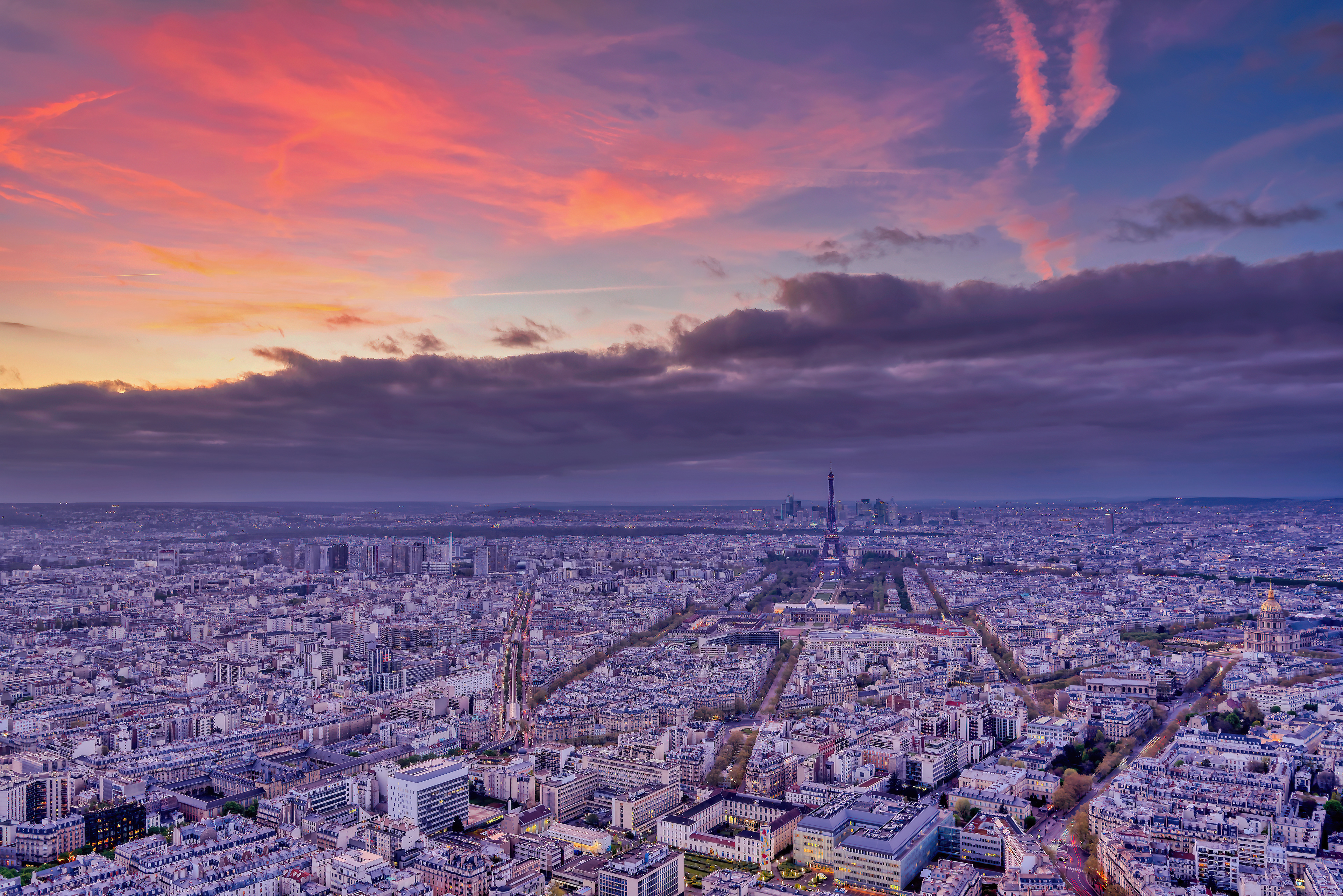 Paris from Above A pastel sunset settles over the endless rooftops of the French capital.