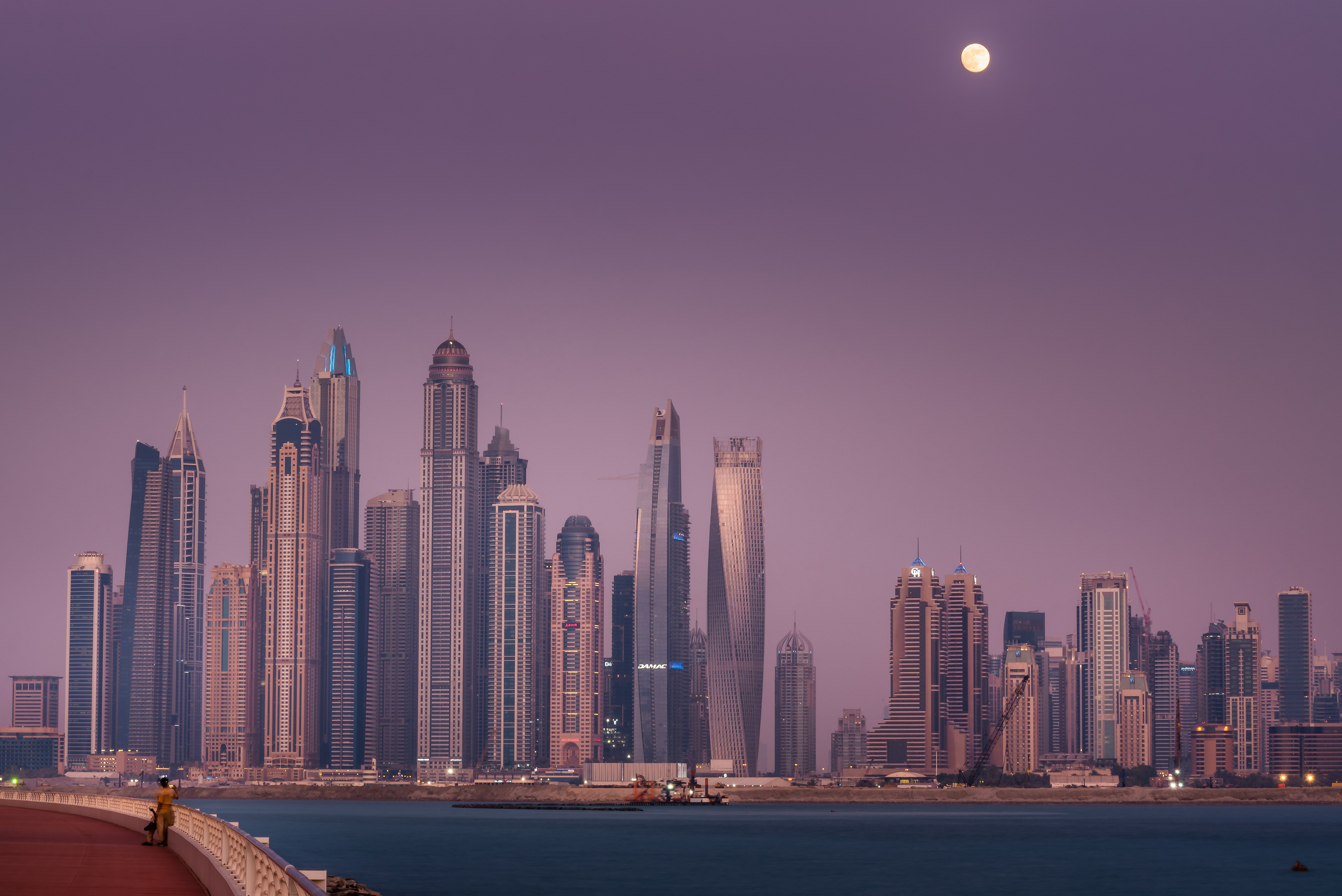 Dubai Marina skyline with fullmoon