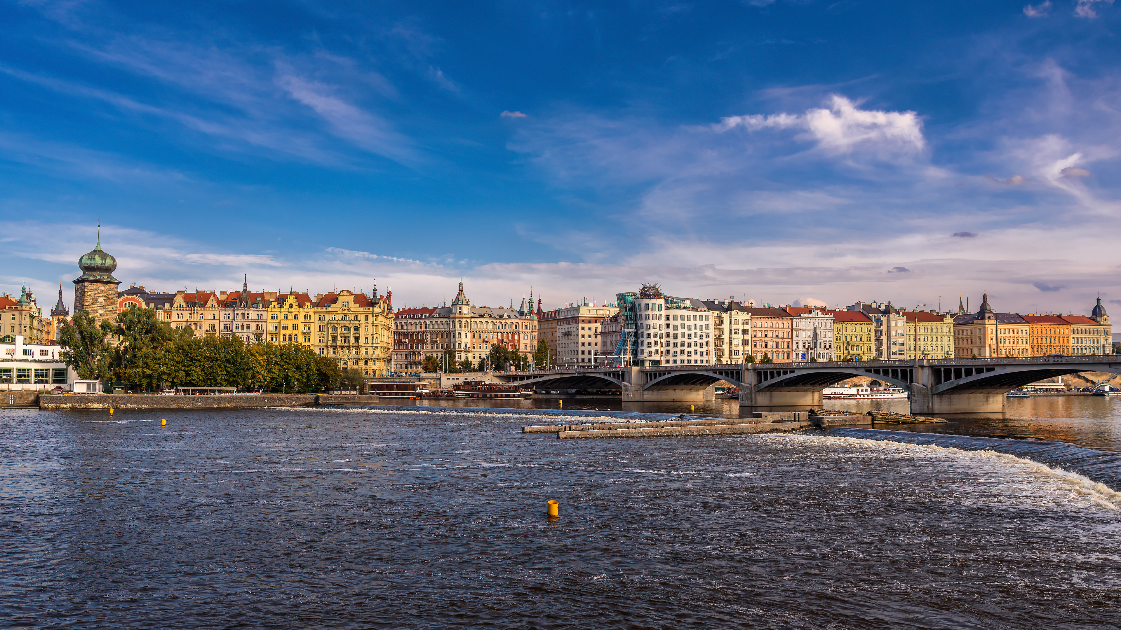 Jirasek Bridge with the Dancing House