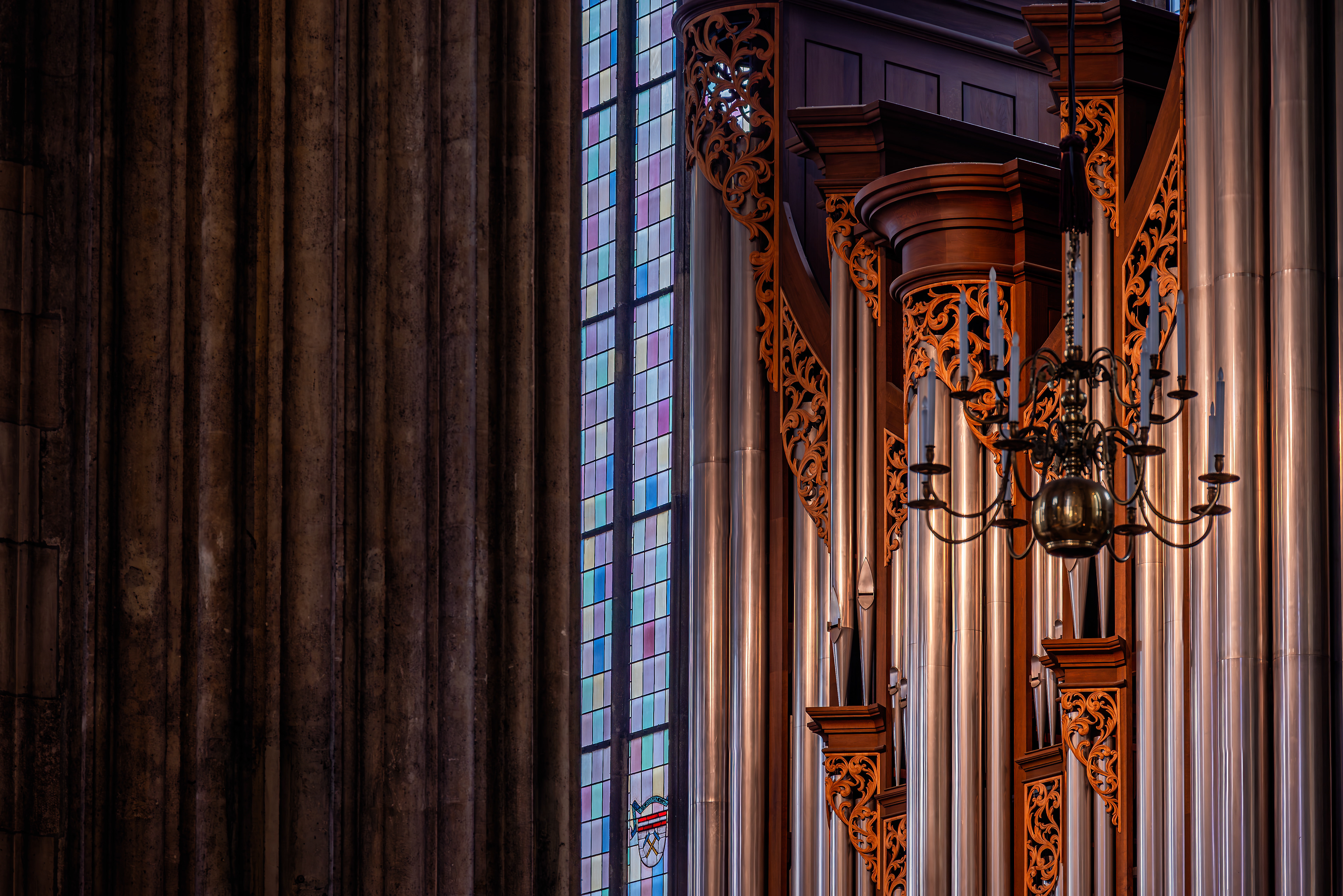 St. Stephen’s Cathedral organ pipes with stained glass window
