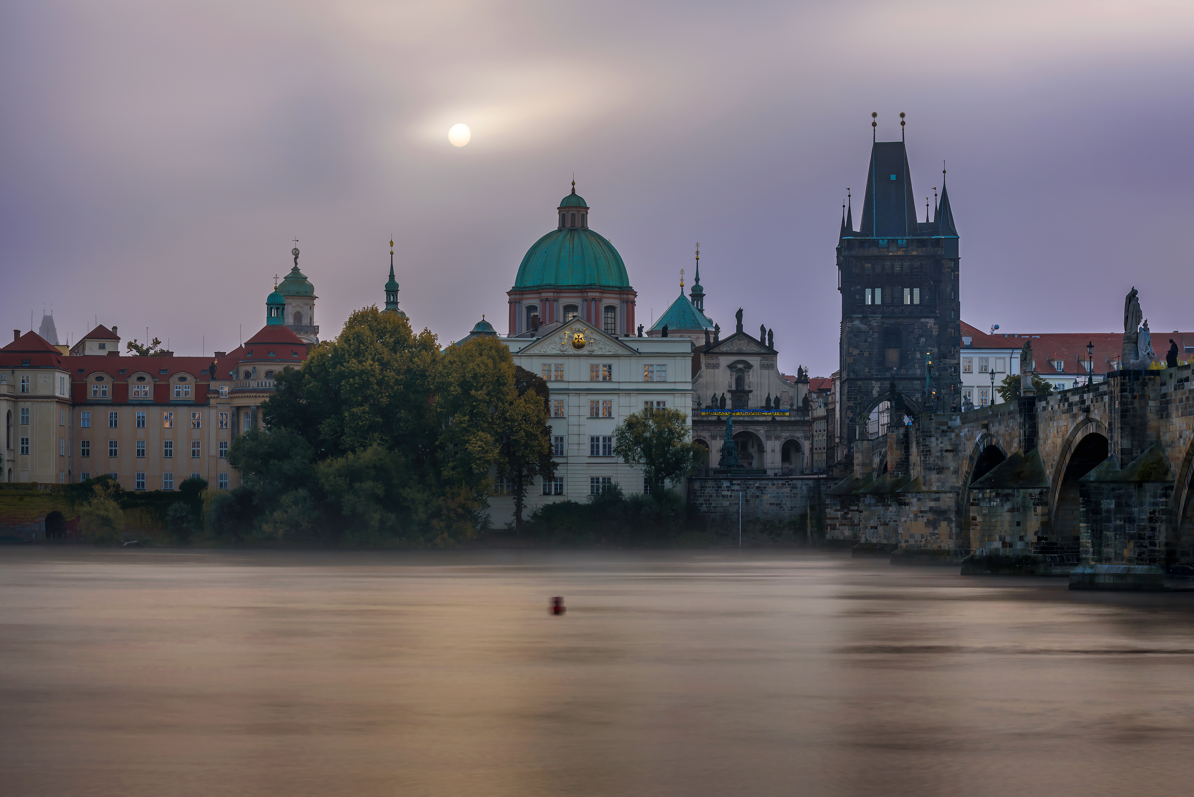 Foggy dawn at the Charles Bridge