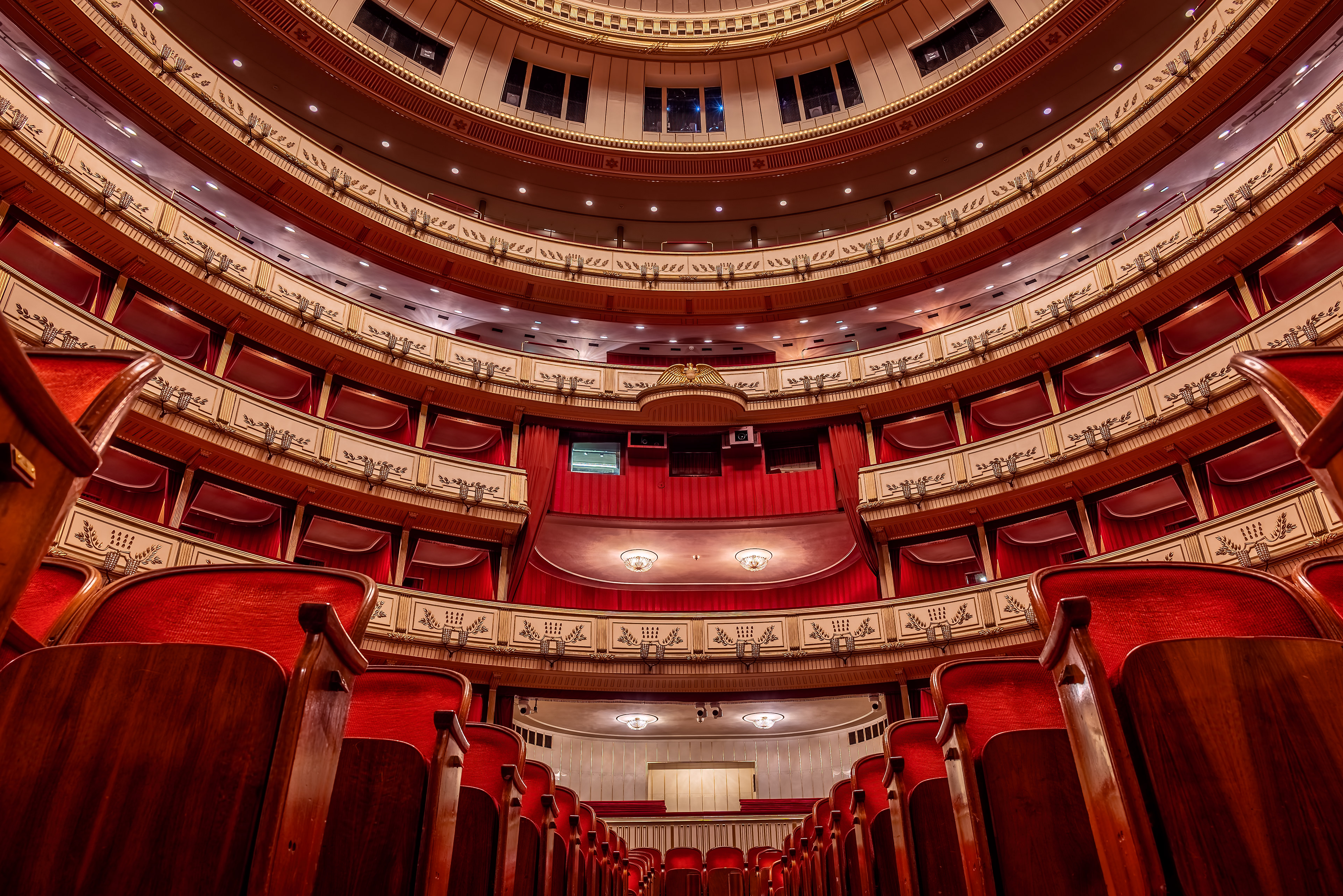 Vienna State Opera auditorium with red velvet seats and balconies
