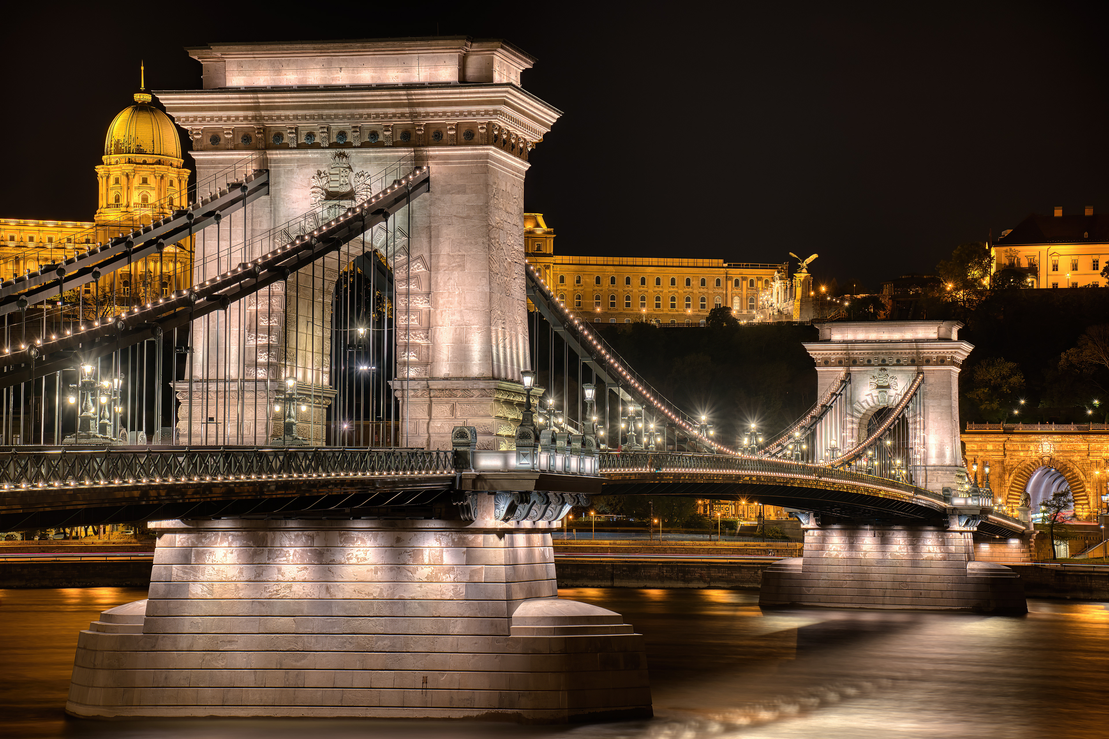 Chain Bridge at Night Budapest shines through the elegance of its most famous bridge.
