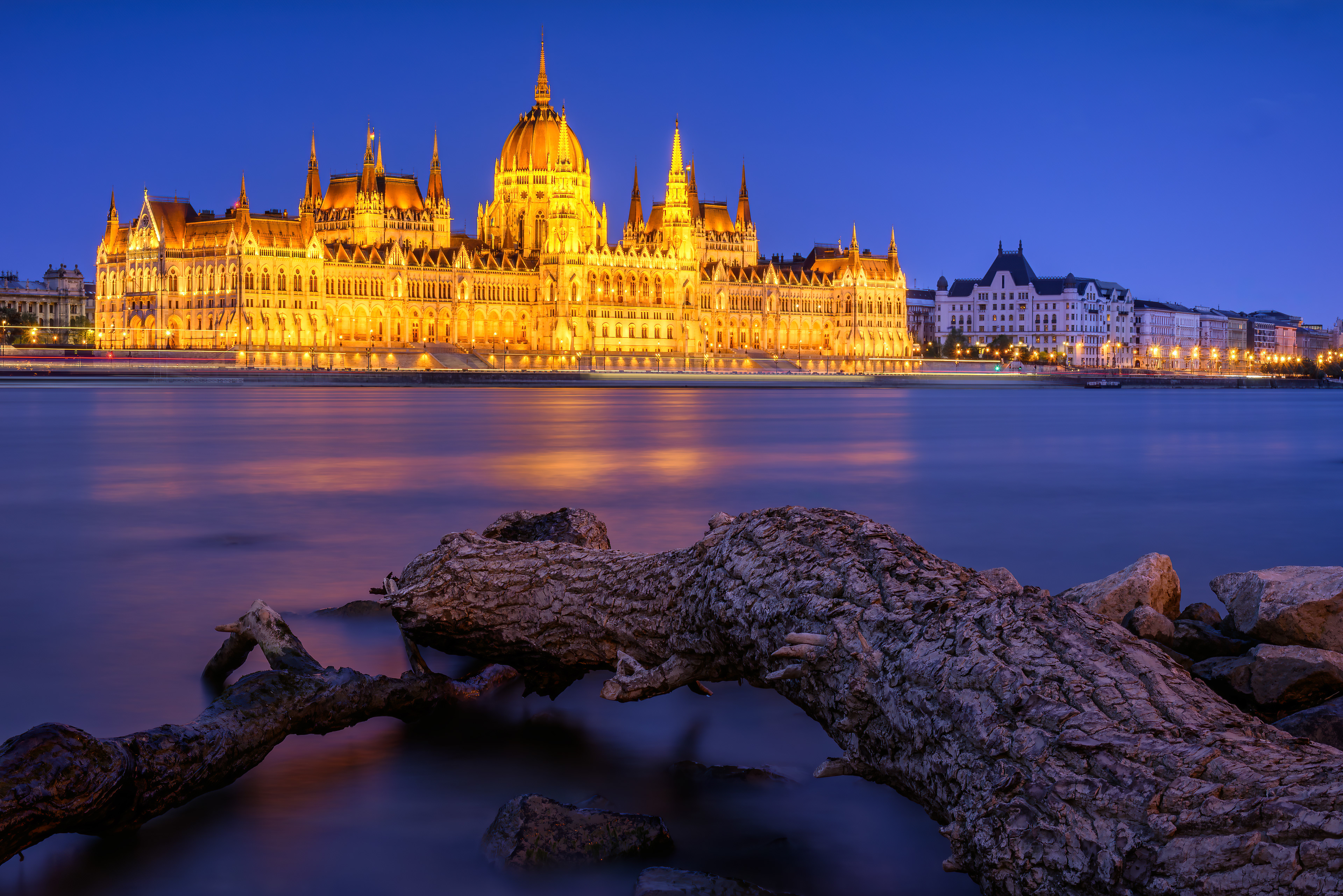 Hungarian Parliament at Blue Hour Reflections and illumination transform Budapest's iconic riverside landmark.