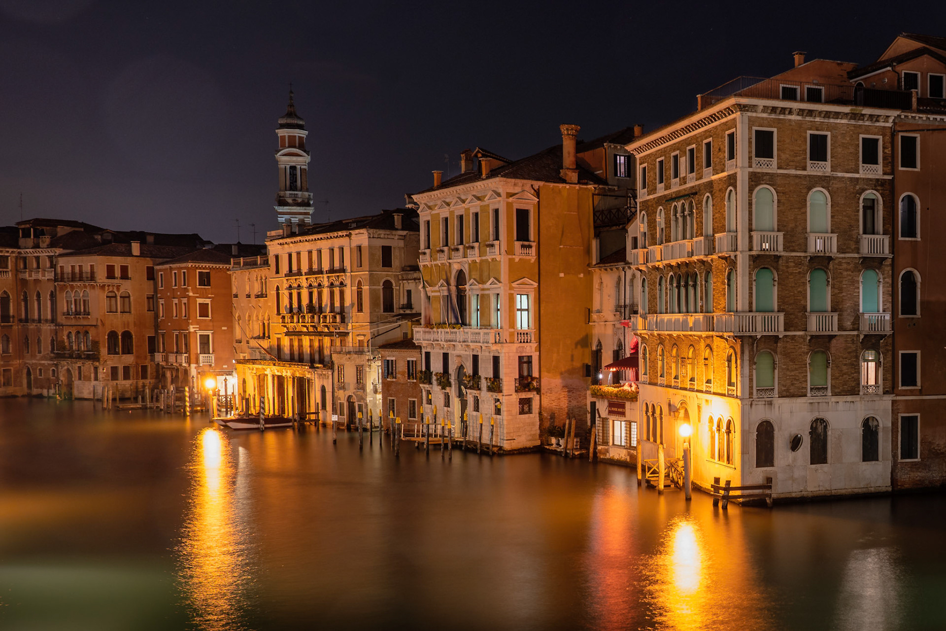 Sometimes you have to look at the view on the other side. While most people focus on the southern view from Rialto Bridge, looking north on the less crowded side yielded this long exposure of the beautiful canal-front properties. I took several shots, almost all with light streaks of the passing boats, but was patient to capture this one without any.