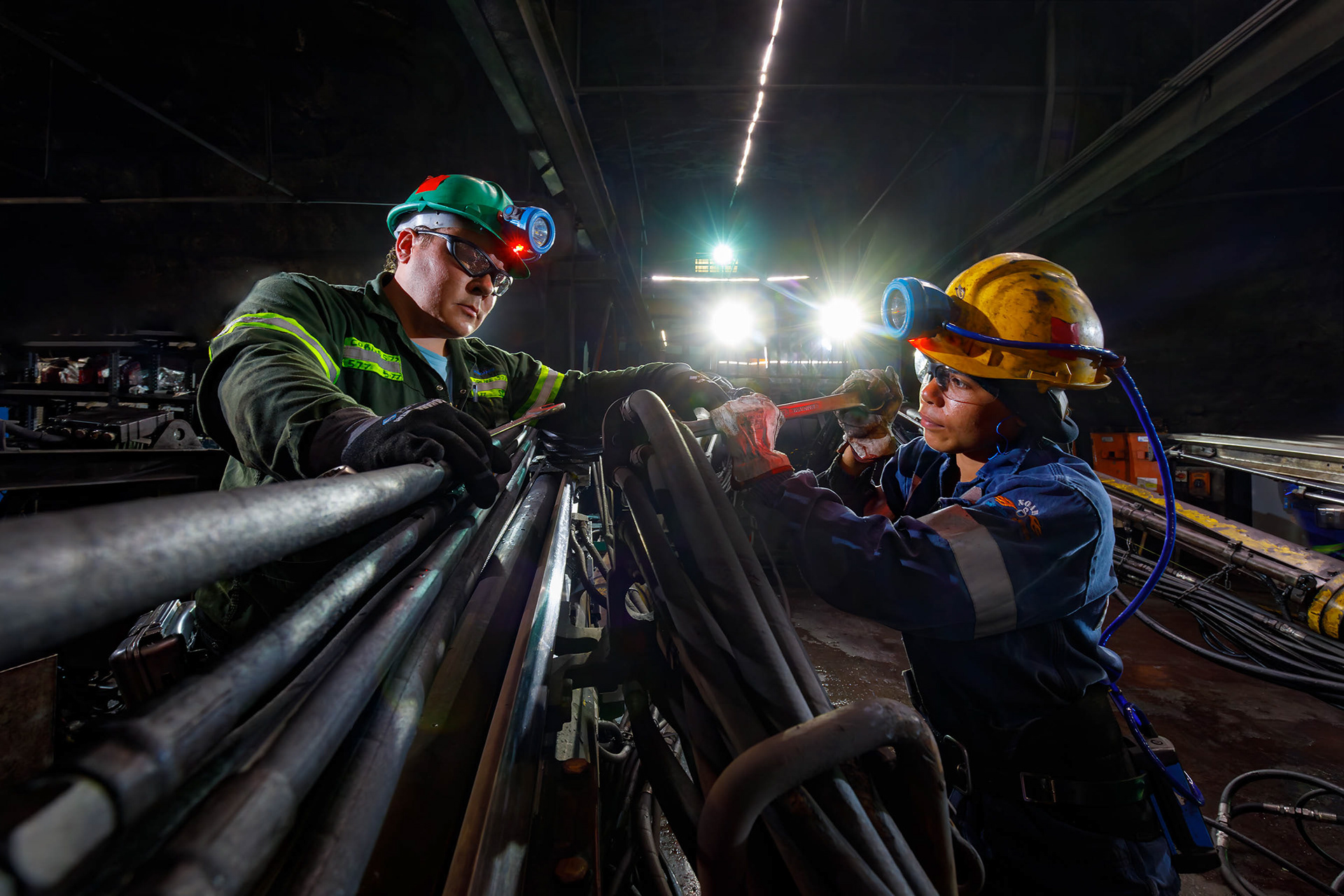 Underground twin boom mining machine under repair 