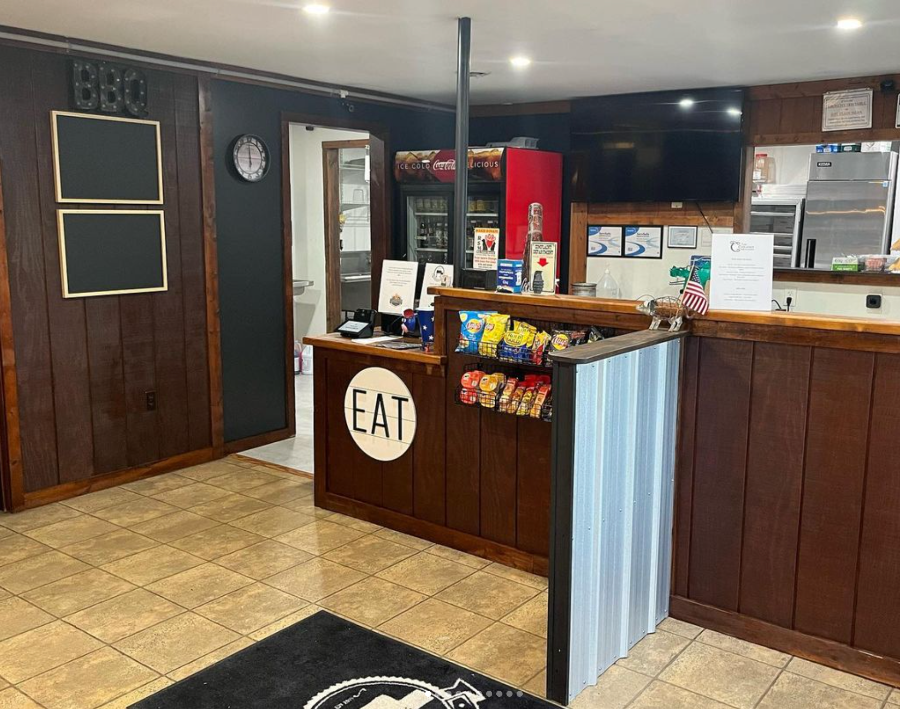 Writing the weekly specials on butcher paper wasn't the best look, so we upgraded to chalkboards! As well as sizing down the snack rack so it no longer blocked the view to the dining room.