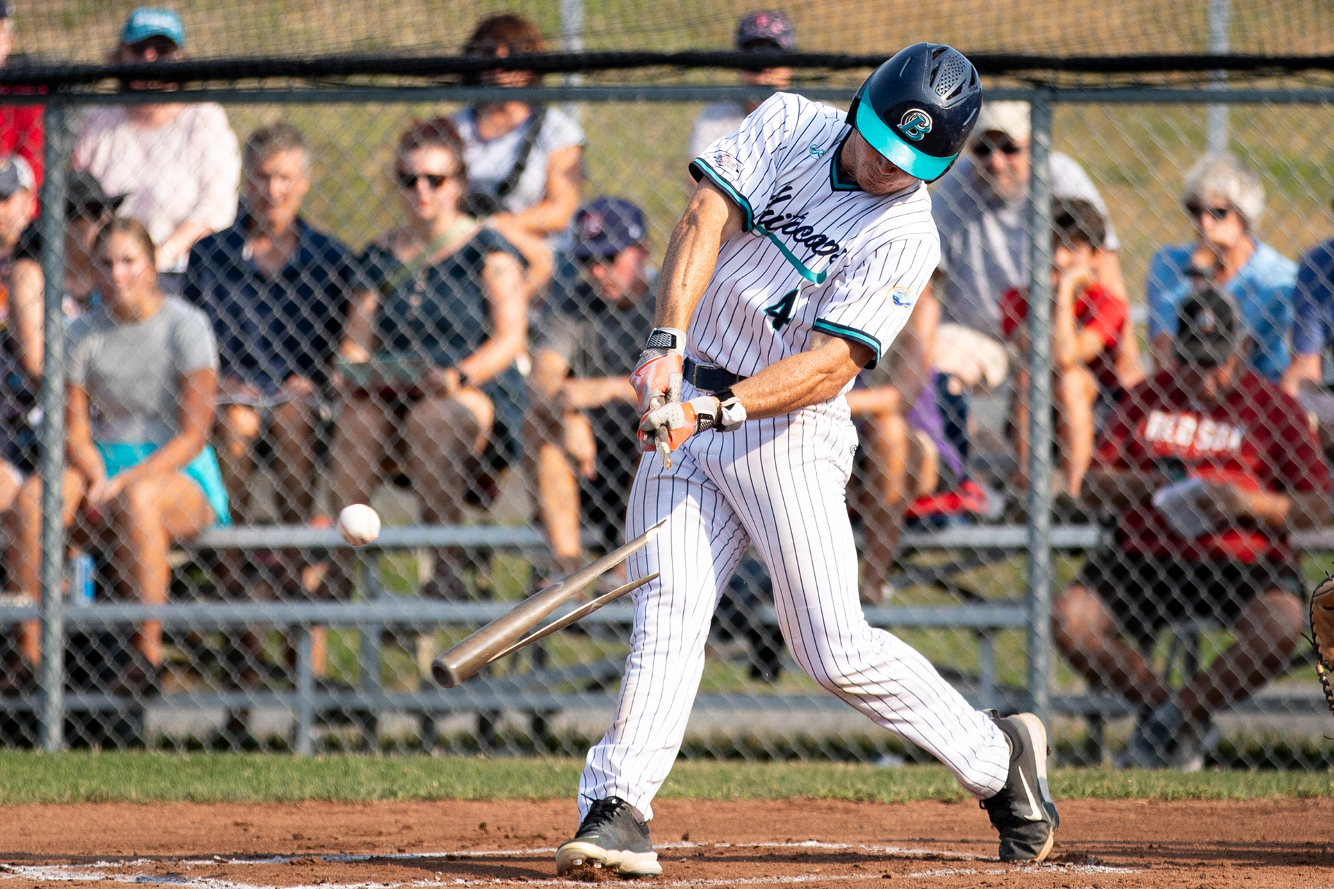 Brewster Whitecaps OF Dallas Macias (4) breaks his bat during the game against the Harwich Mariners at Stony Brook Field in Brewster, Massachusetts on July 17, 2024.