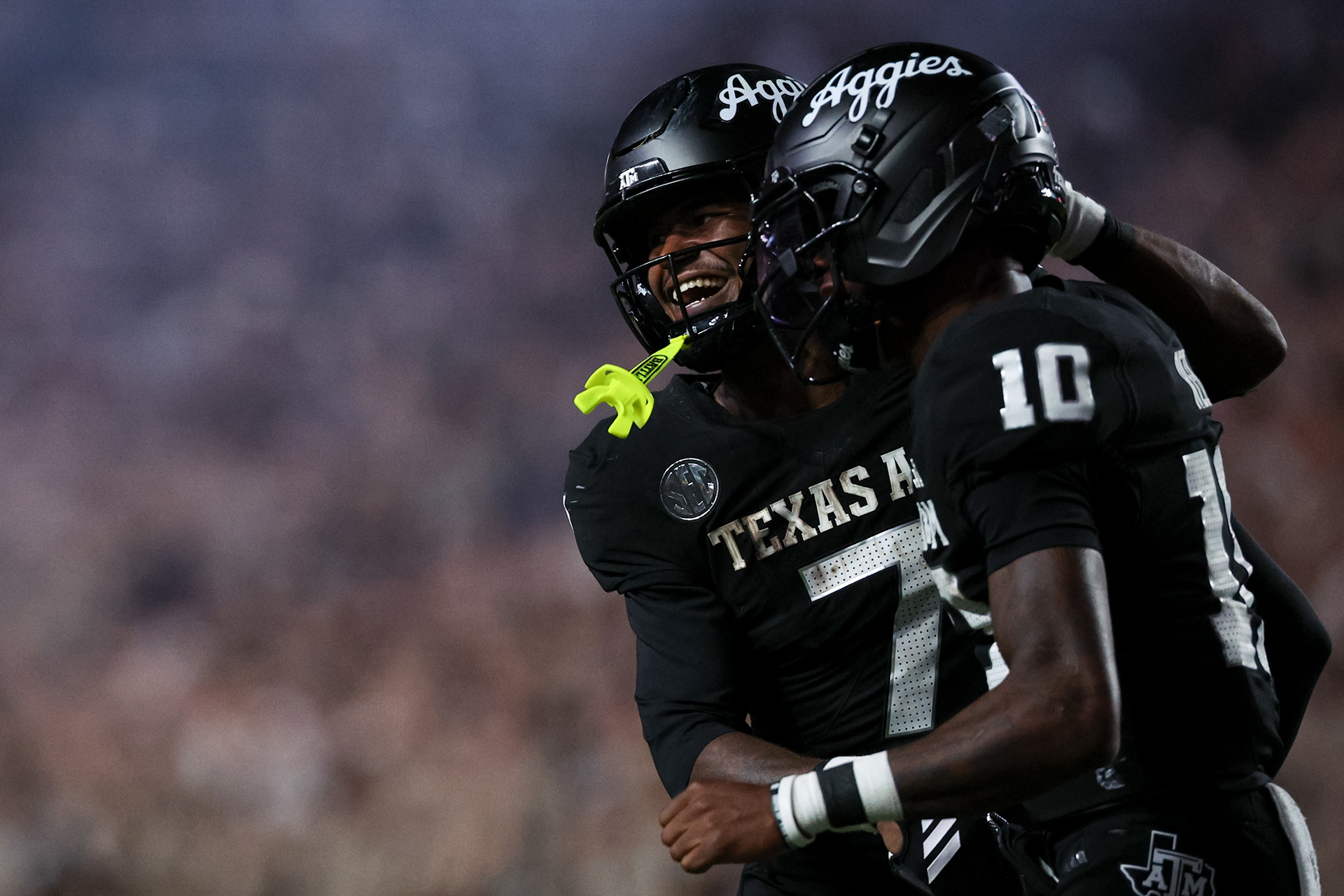 WR KC Concepcion (7) celebrates with QB Marcel Reed (10) after a touch down during the game against the Mississippi State Bulldogs at Kyle Field in College Station, TX on October 4, 2025.