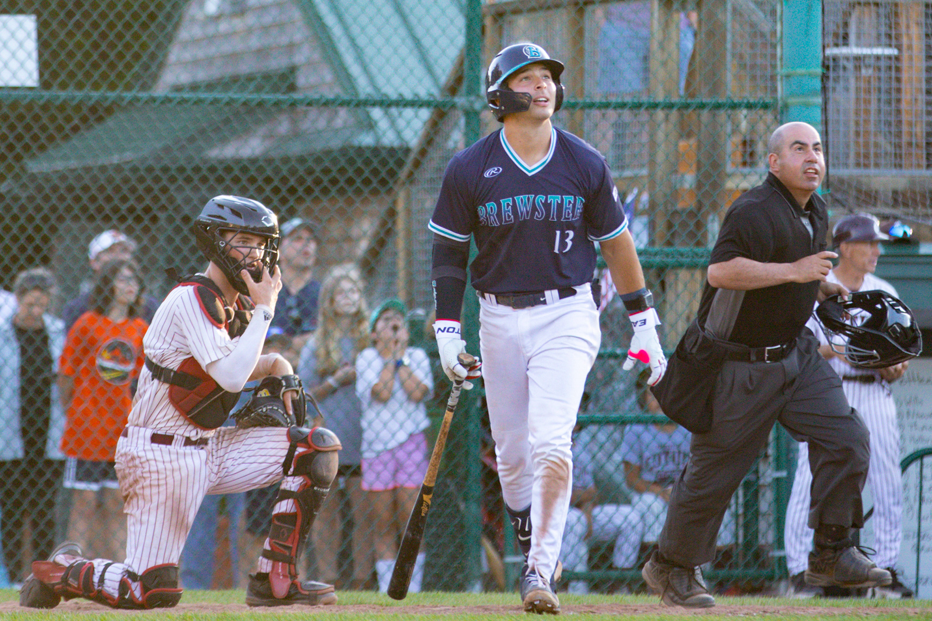 Brewster Whitecaps 3B Andrew Fischer (13) watches his homerun during the game against the Cotuit Keteleers at Lowell Park in Cotuit, Massachusetts on June 27, 2024.