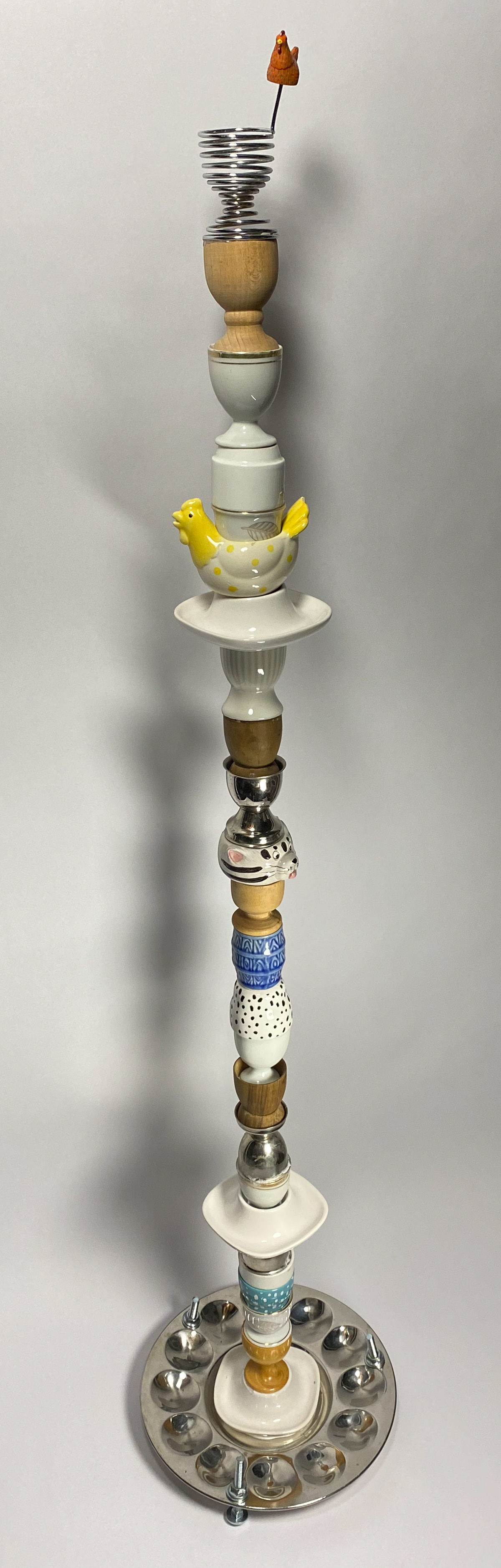 An egg tower build up from all different egg cups