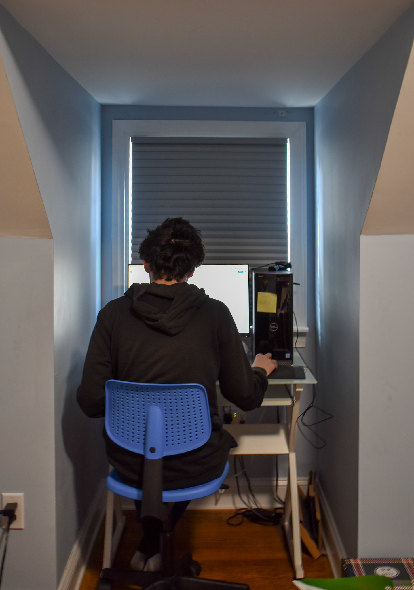 Homework: Owen Gartlan at his desk doing physics homework.