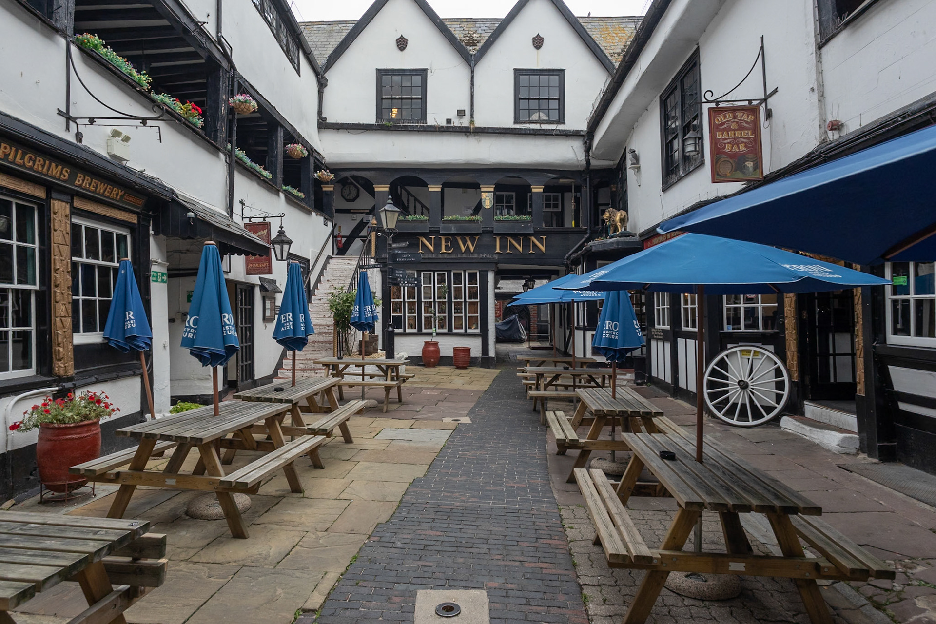 New Inn courtyard. Lady Jane Grey was staying here when she was proclaimed queen of England. Her reign lasted for nine days. She was beheaded at age 16 for high treason