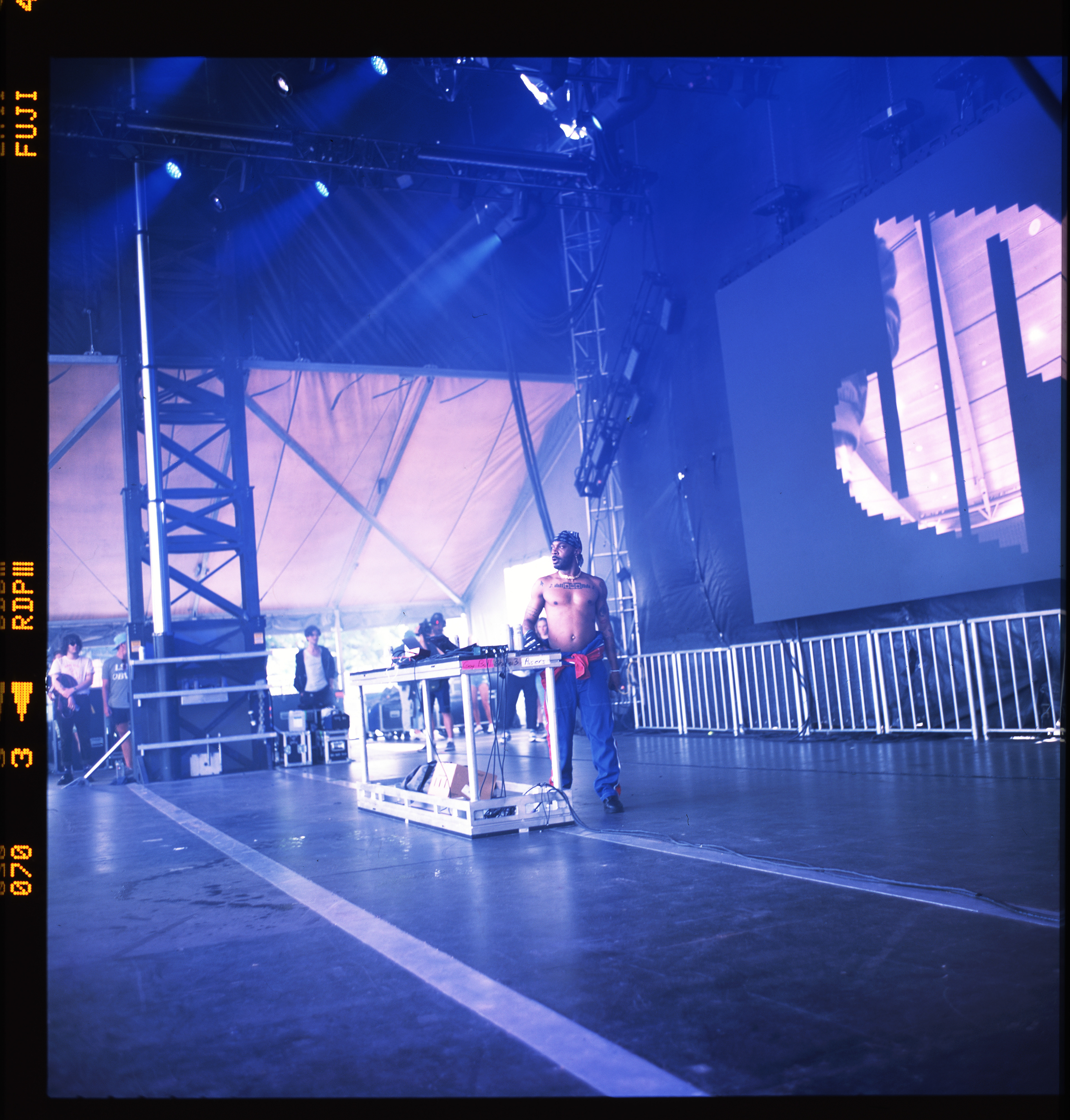 Color photograph of the musical artist JPEGMAFIA performing on stage for GovBall Musical Festival