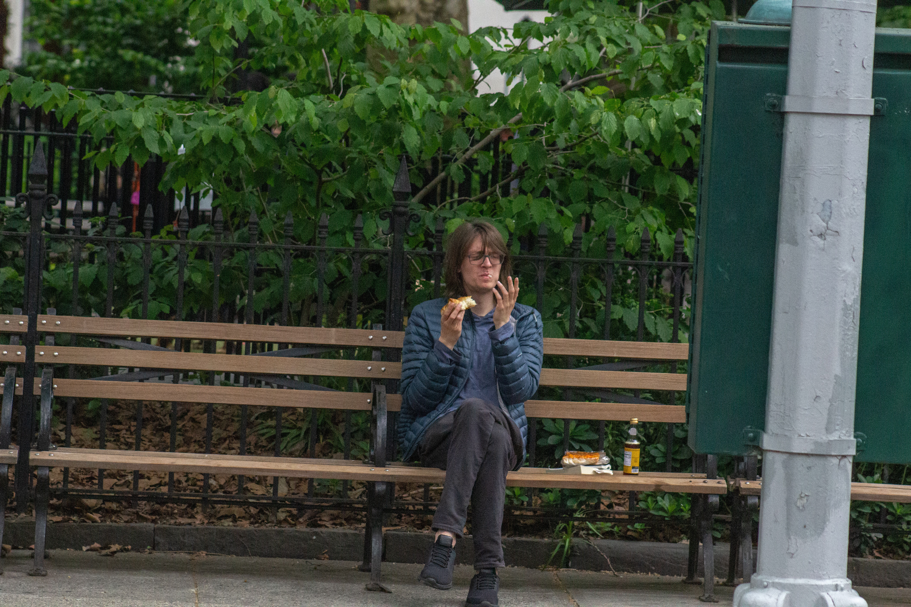 He reminds me of an old classmate. I wonder what was in the sandwich that gave him this sour face. 