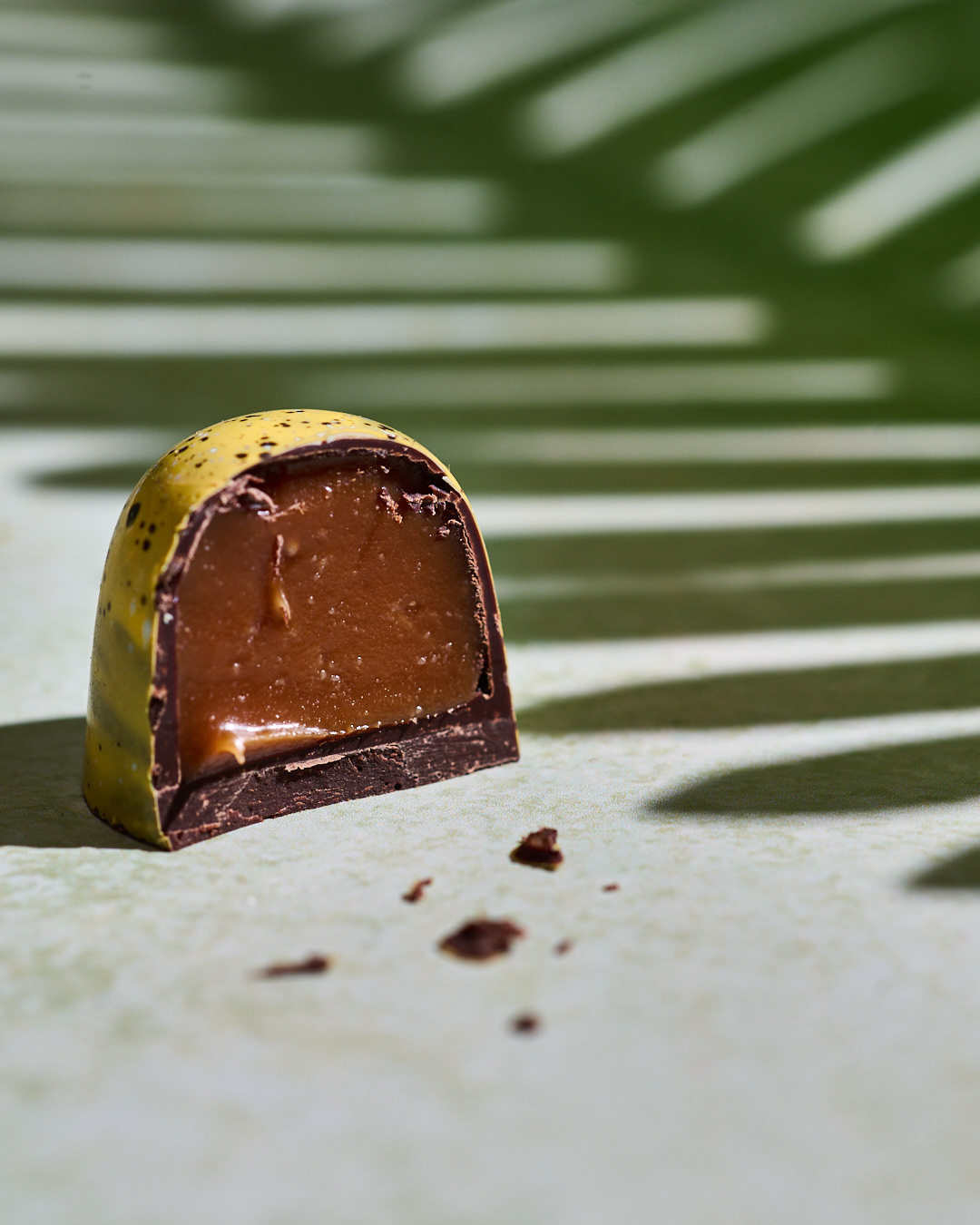 AN wonderful capture of a chocolate truffle cut in half to show the oozing centre taken by Anusha Stewart Media