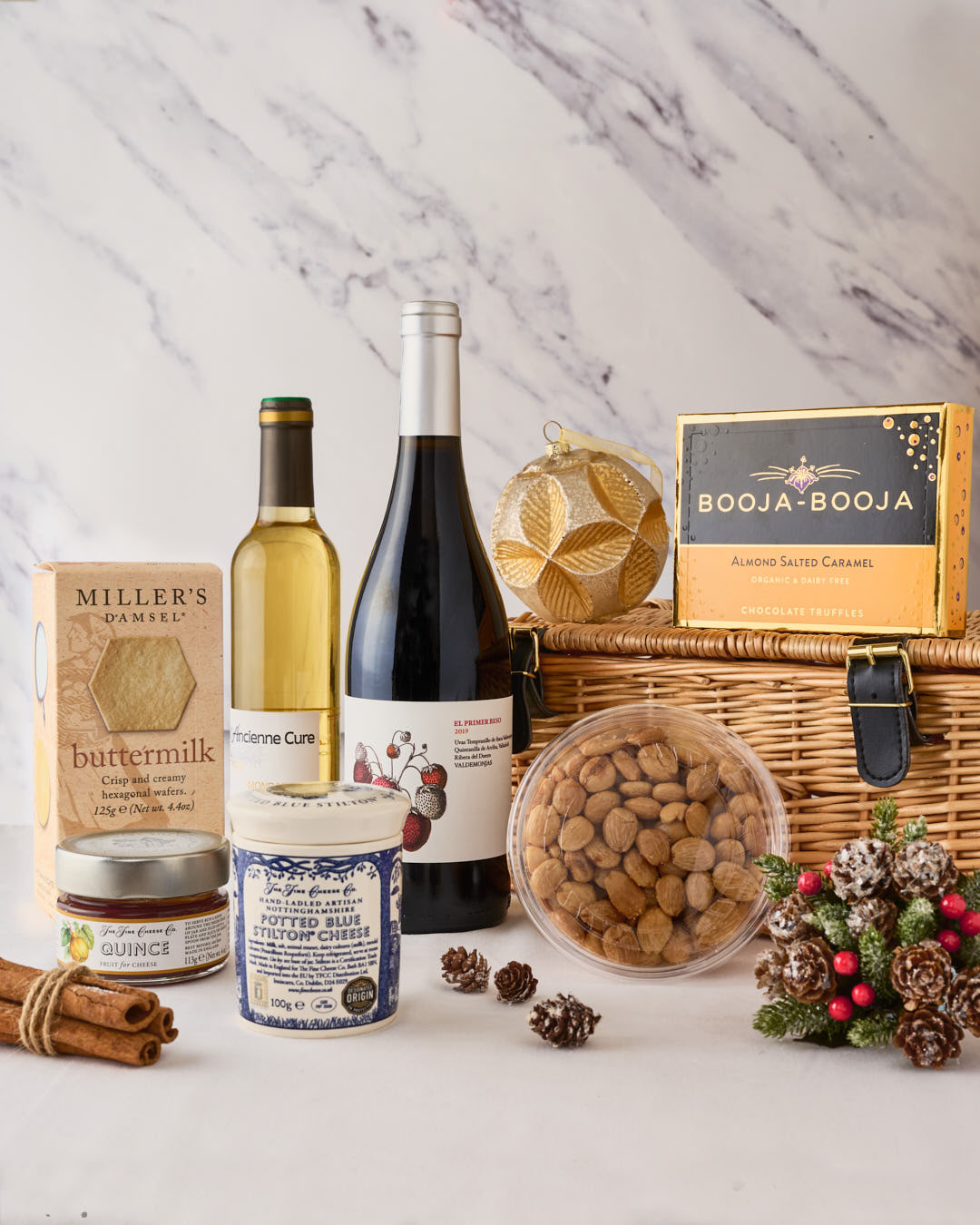 A hamper of wine, cheese and biscuits