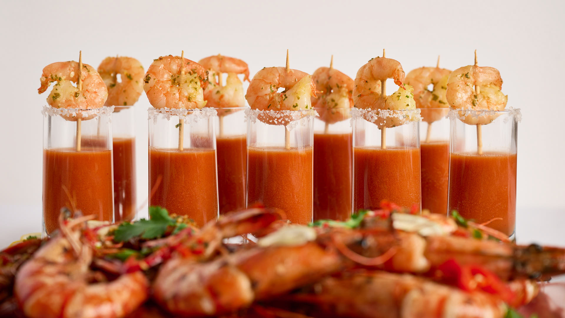 9 Bloody Mary vodka shots with prawns on top