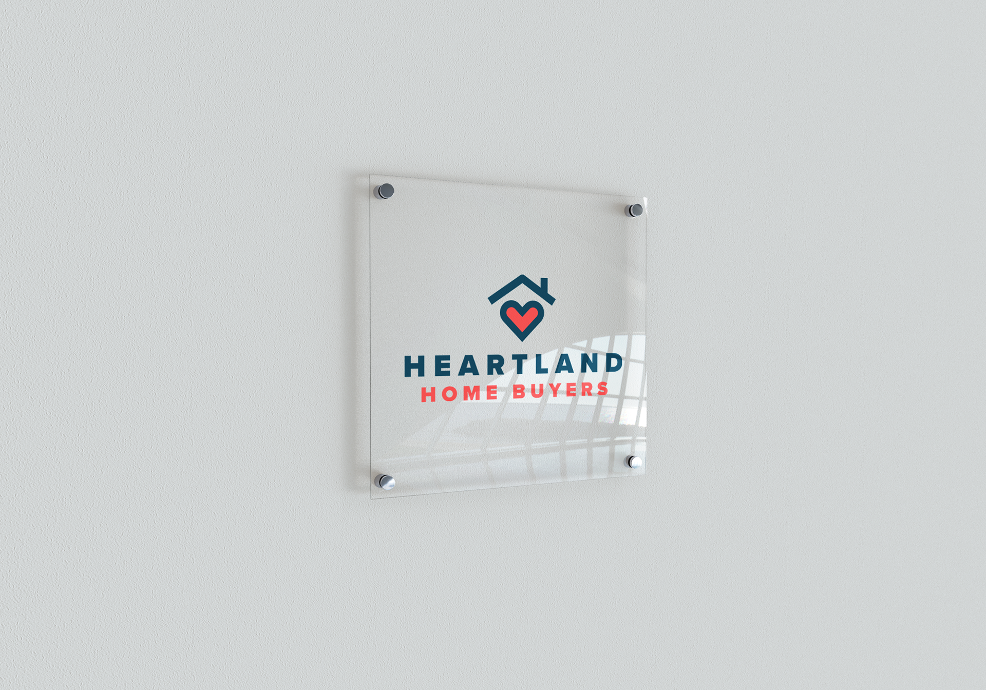 Mockup of a sign with Heartland Home Buyers logo.