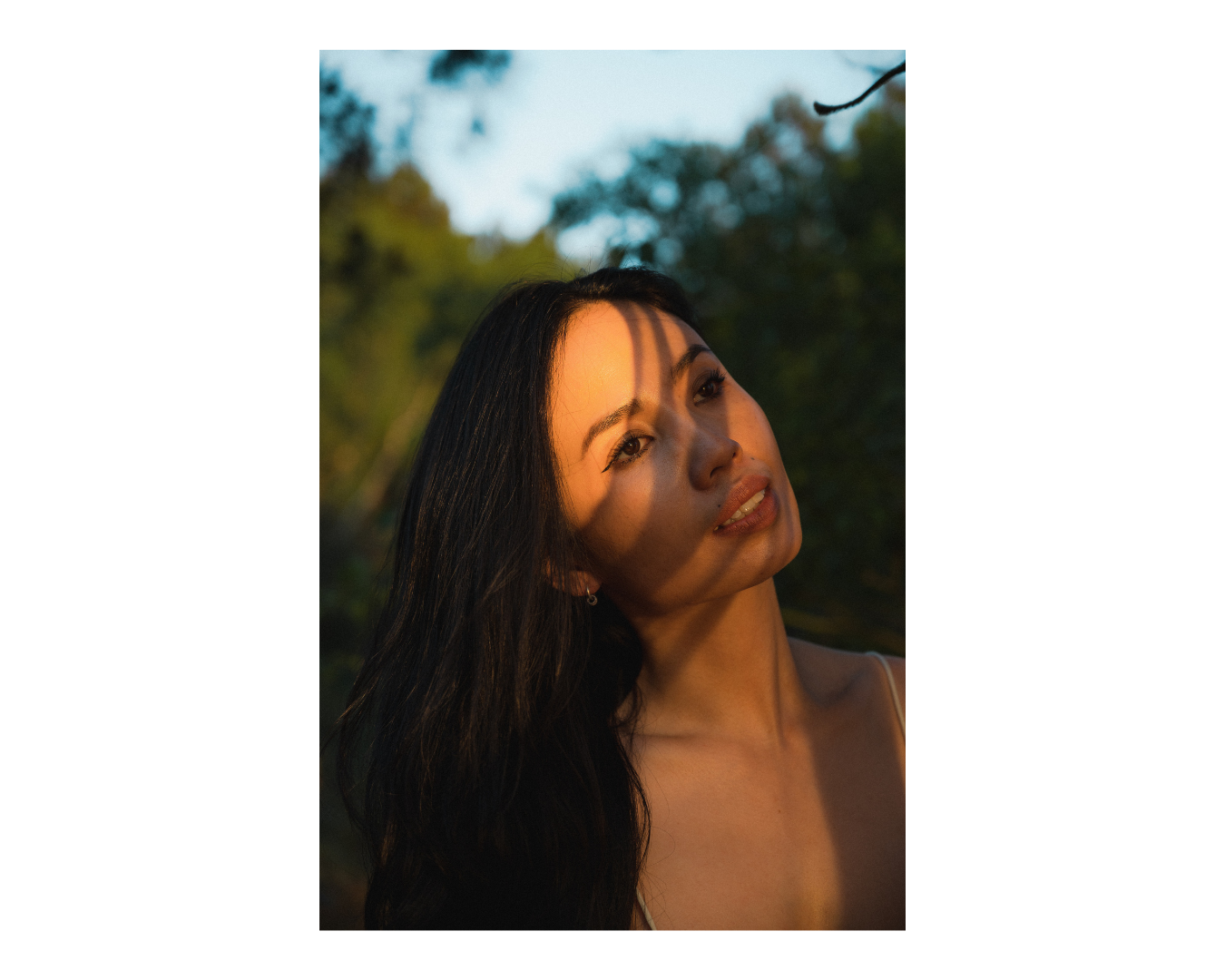 portrait of an asian woman in sunlight and shadow