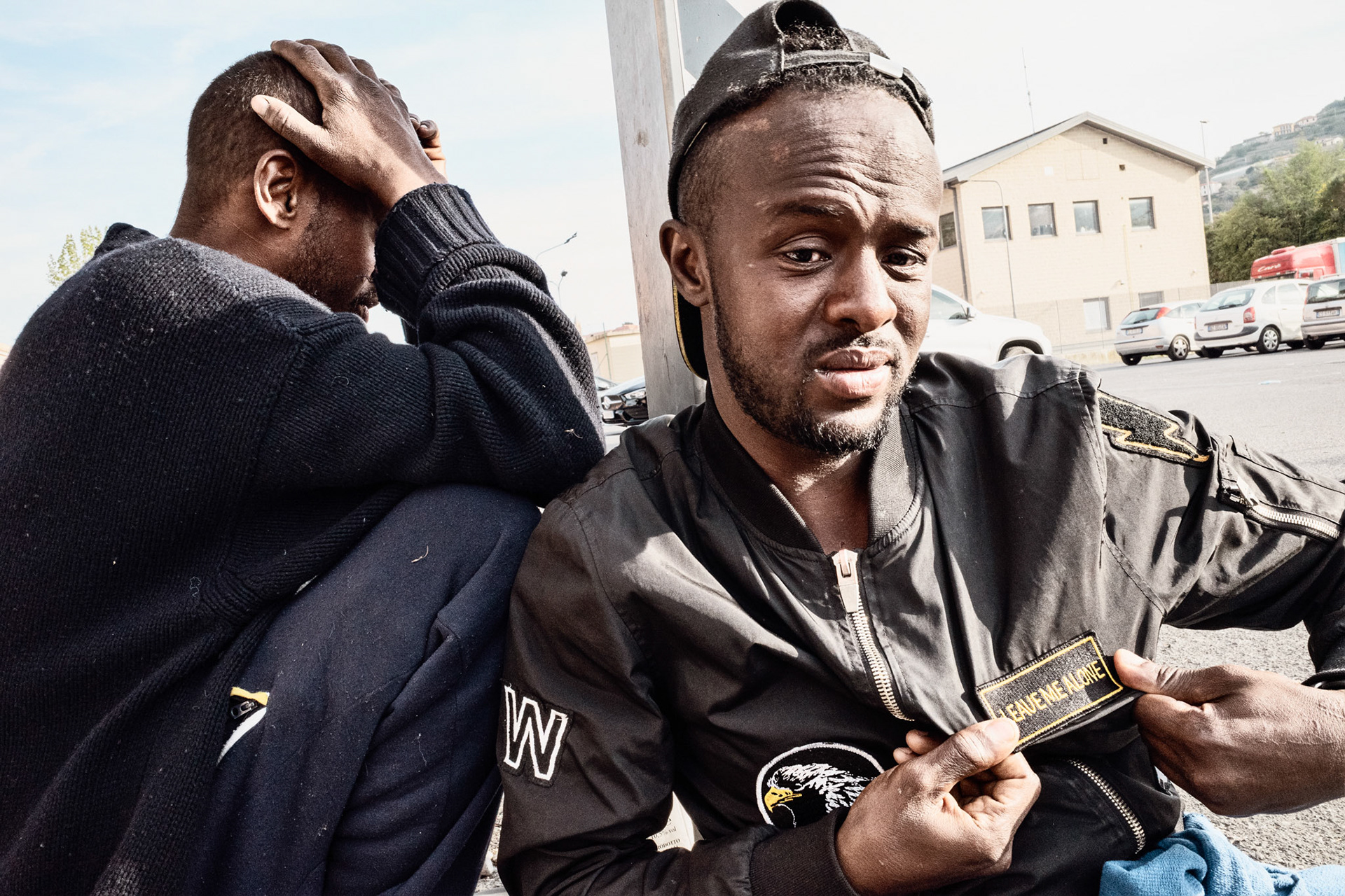 Said, a 27-year-old Somali was plagued by severe trauma and addiction due to various failures in his migration project. At the end of April 2023, he spent his entire days in the car park of a supermarket. After about a month, his lifeless body was found on the Bordighera coastline, possibly as a result of a suicide, or a consequence of his alcoholism. The 'LEAVE ME ALONE' patch sewn on his only jacket was the one element that allowed his remains to be recognised.