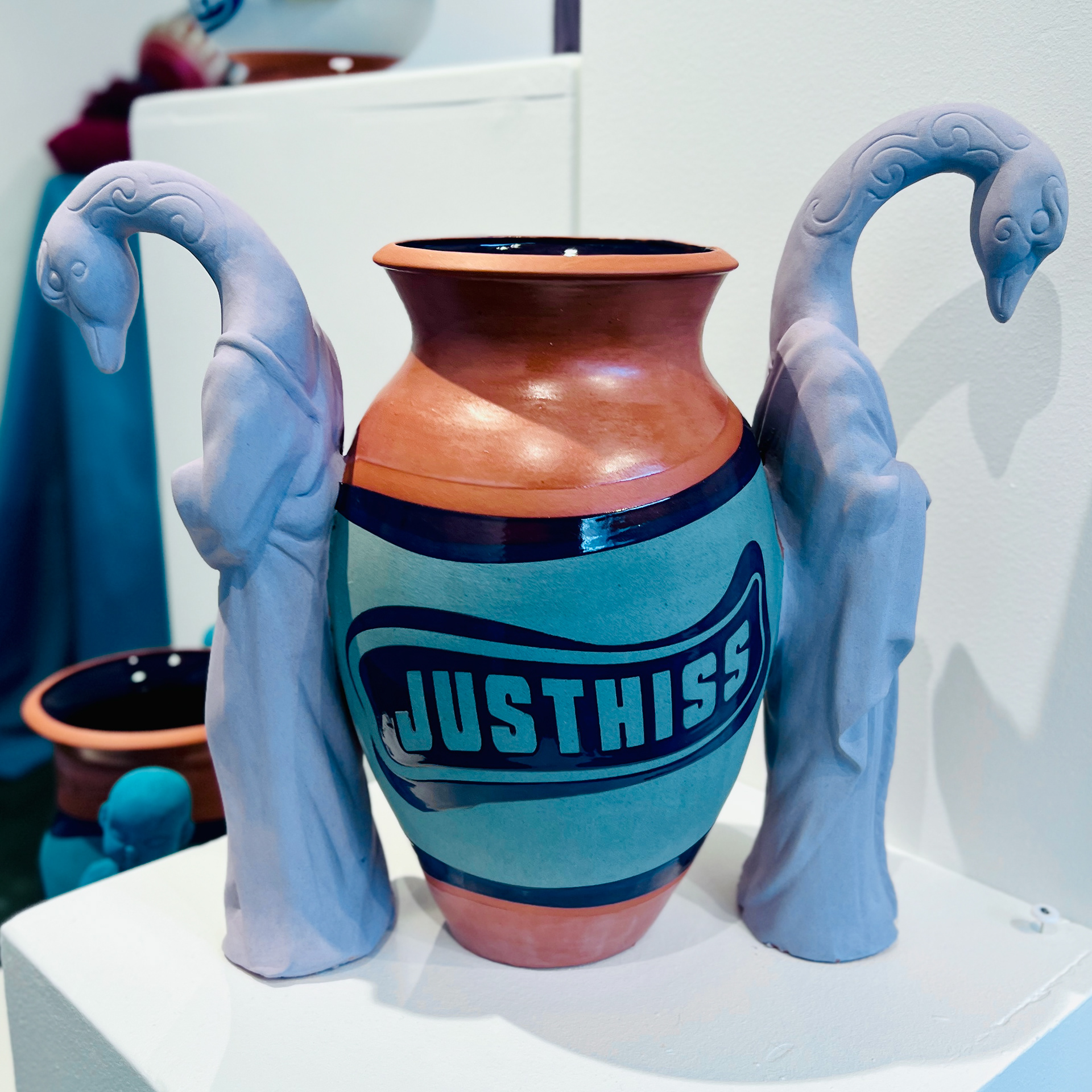 Justhiss, 2024, glaze on low-fire terracotta, 7 x 15 x 12 in