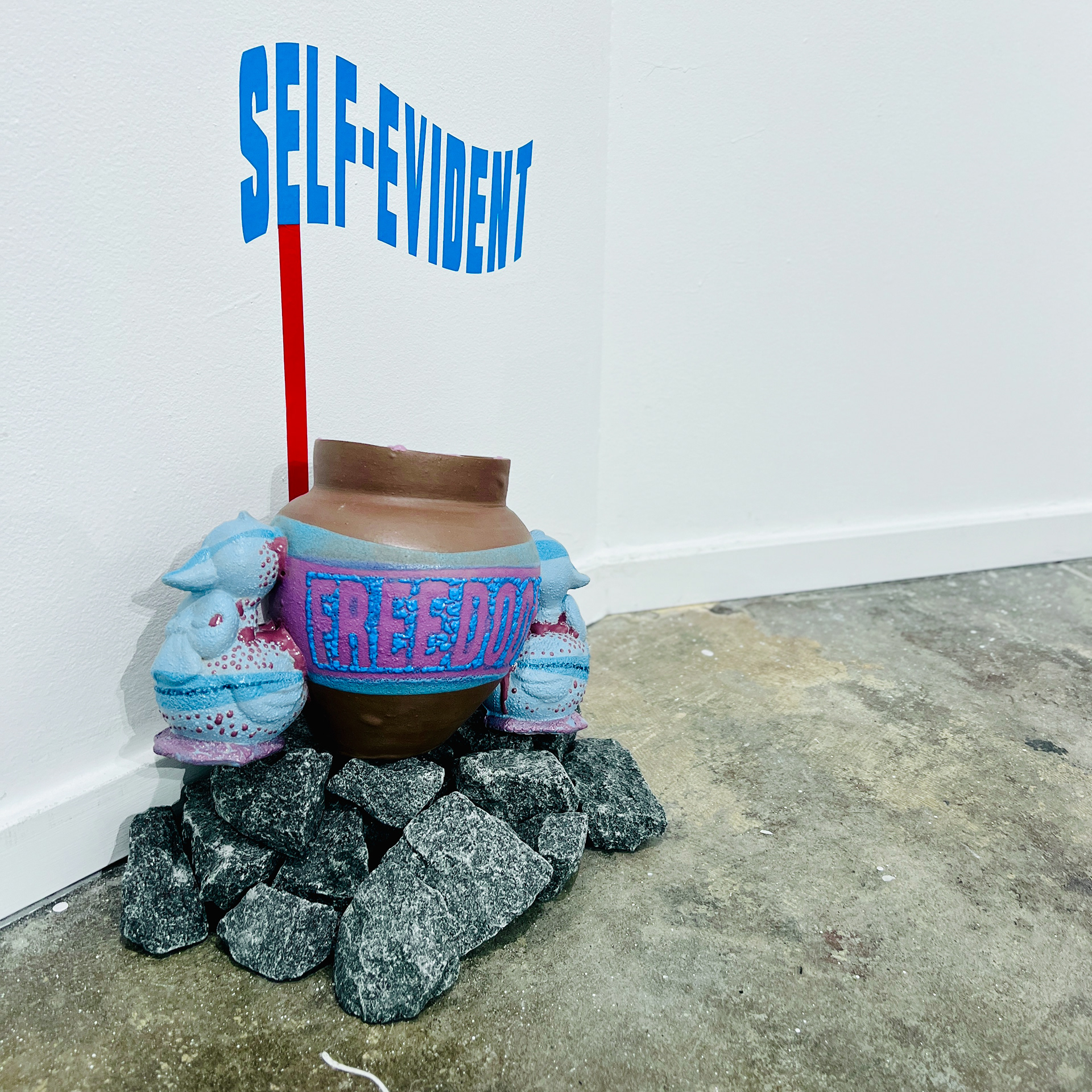 Freedoom, 2024, glaze on low-fire terracotta, 7 x 7 x 12 in