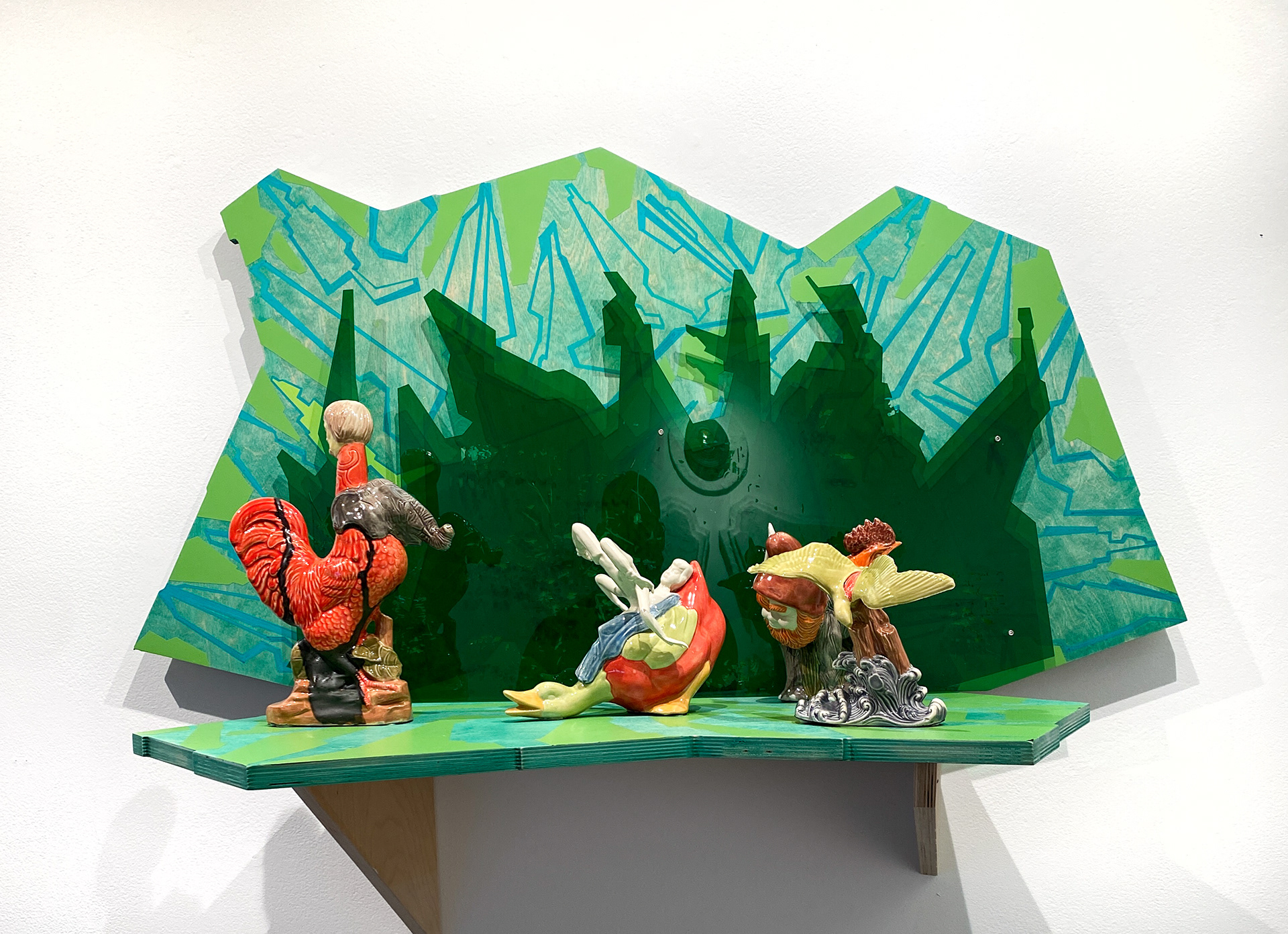 Ecocide Scene 3: Amazon Forest (platform), 2022, slip cast porcelain figures, laser cut acrylic, 36 x 20 x 20 in