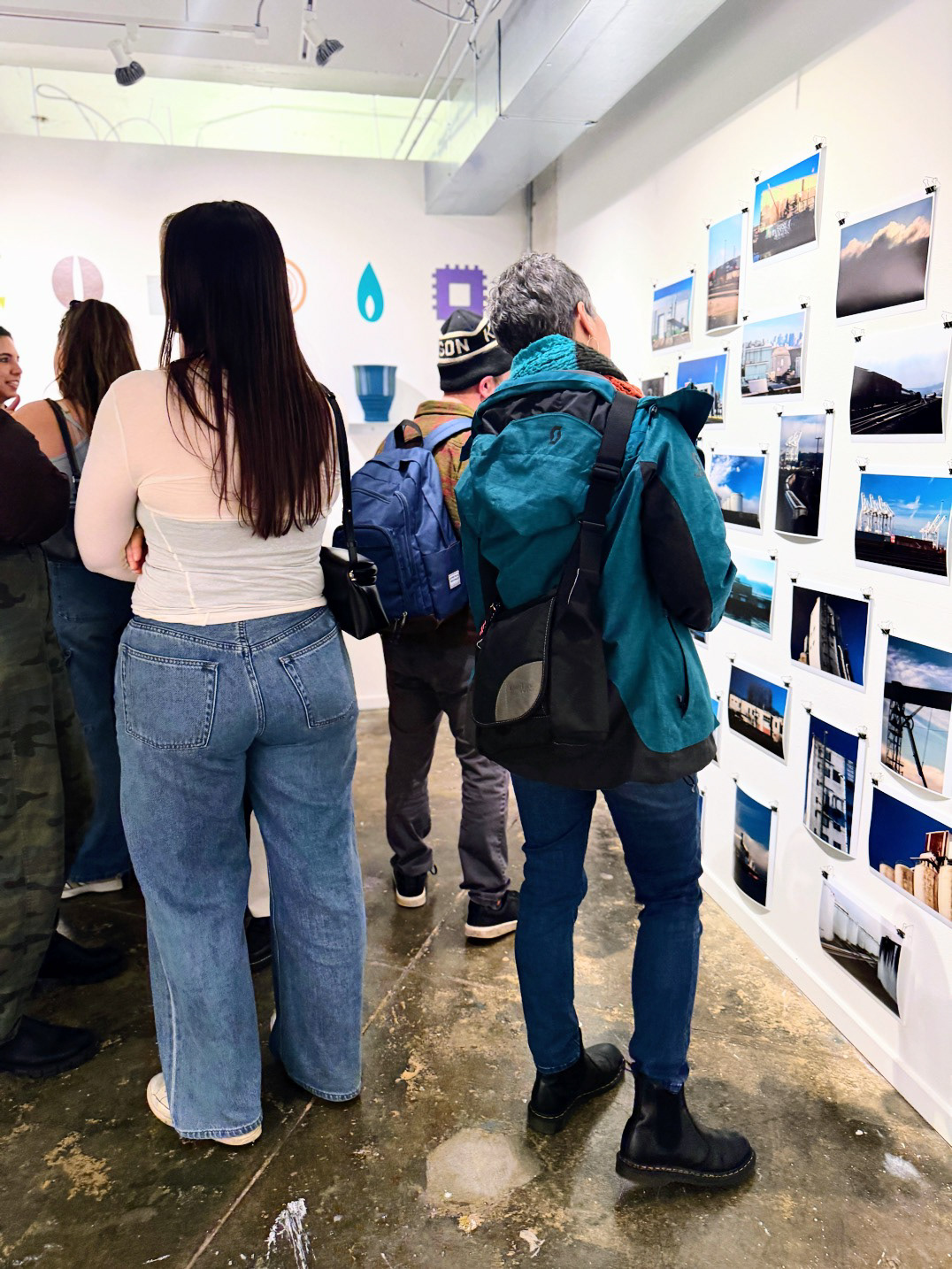 Barcode Series, installation view, 2026, ceramic vessels, vinyl icons, and photographs, documentation image, opening reception.