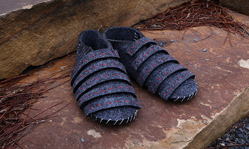 Hand-made laser cut felt shoes created for freshman design studio.