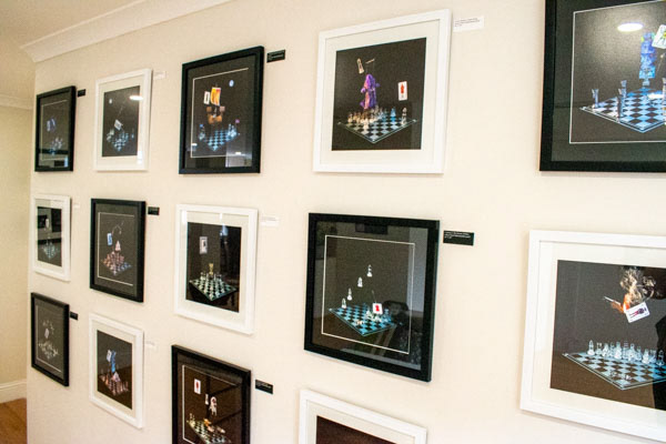 framed Scotland's Chequered Throne images on a gallery wall