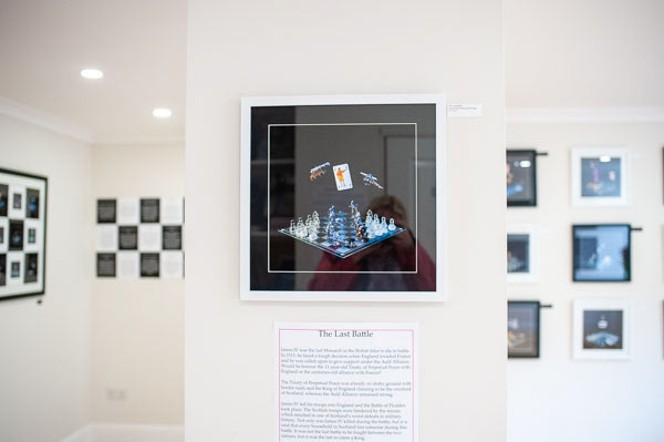 Scotland's Chequered Throne displayed on a gallery wall.