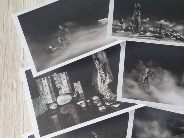 . Image of Art photography cards of witches the devil and the King collection with black-and-white photographs.