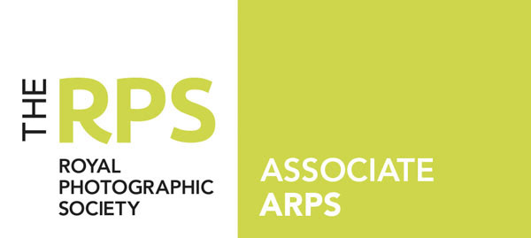trust stamp half white half yellow-green with text that says The RPS Royal Photographic Society Associate ARPS