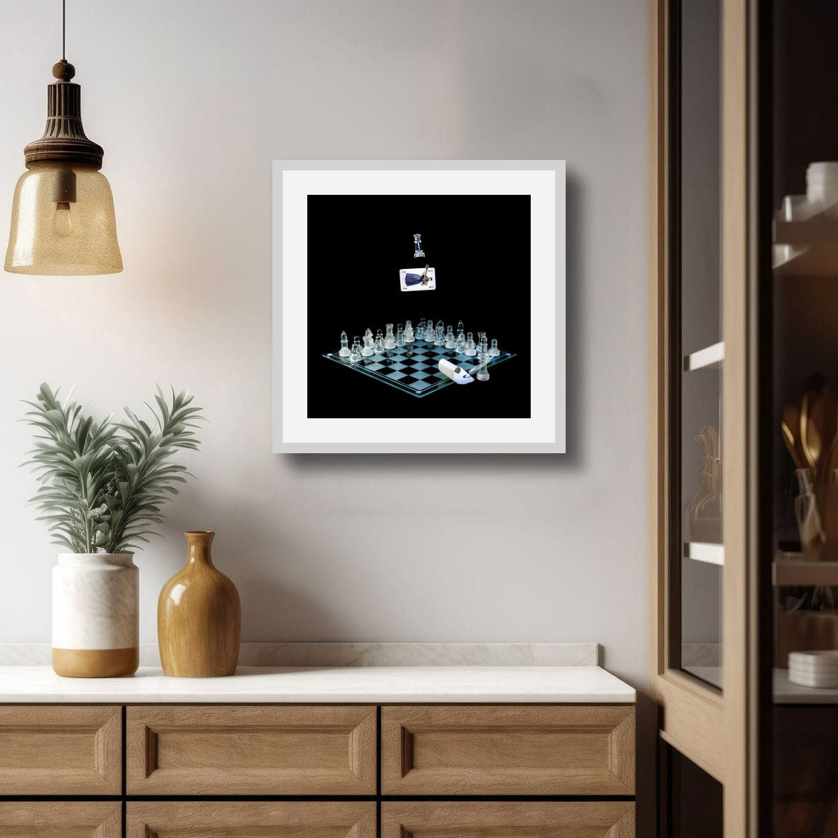 Framed artwork of Mary Queen of scots the execution on a wall above a wooden cabinet.