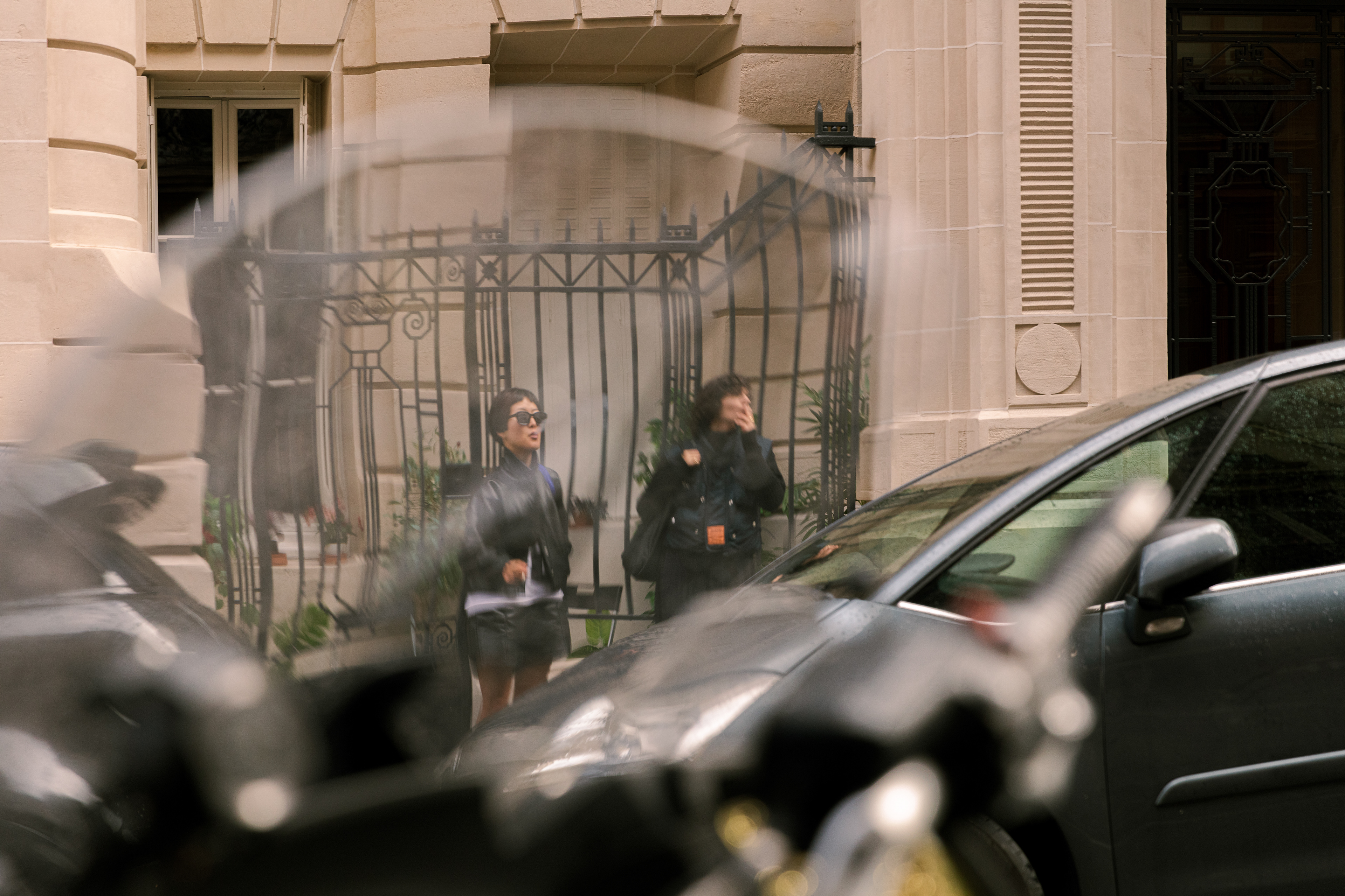 Women taking a smoke break at Paris Fashion Week, France, September 29th 2022.