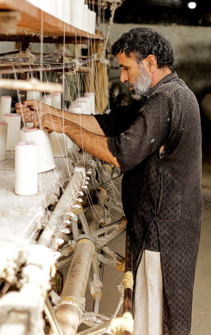 Malik at a local textile manufacturing unit in North Nazimabad in Karachi, Pakistan.