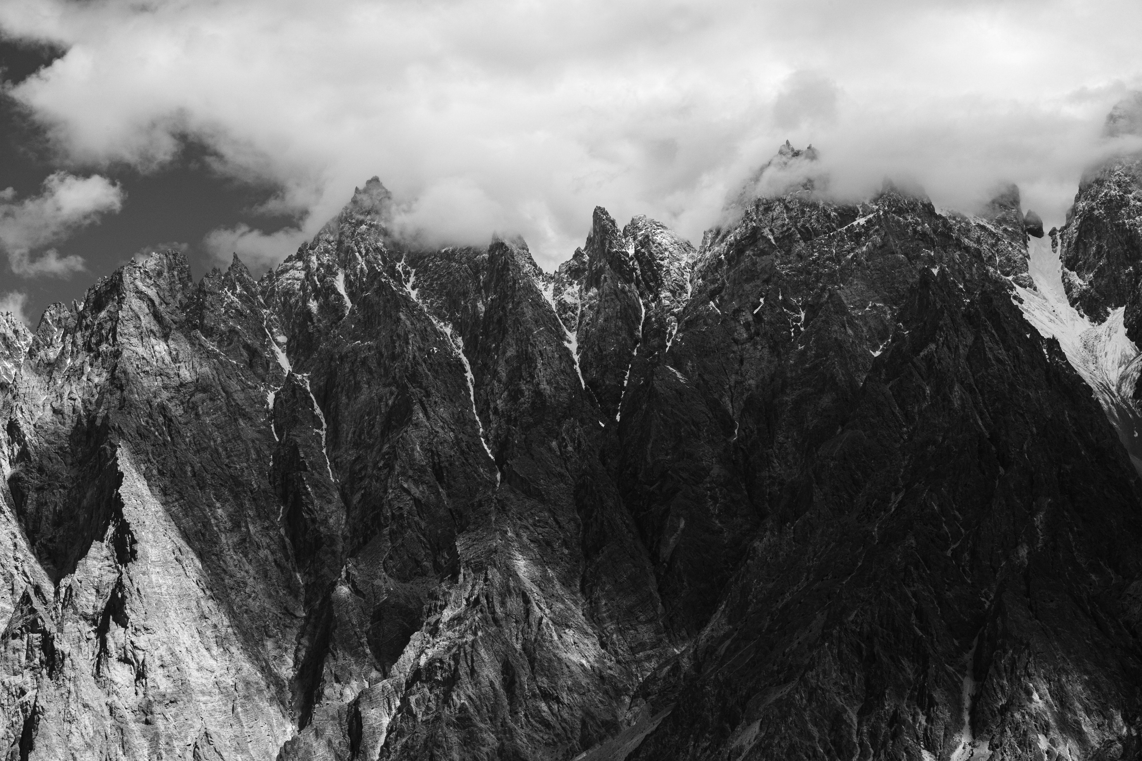 Another view of of Passu Cones, also known as Tupopdan, in Passu Village near Gulmit, Gilgit Baltistan, Pakistan on May 5th, 2022.