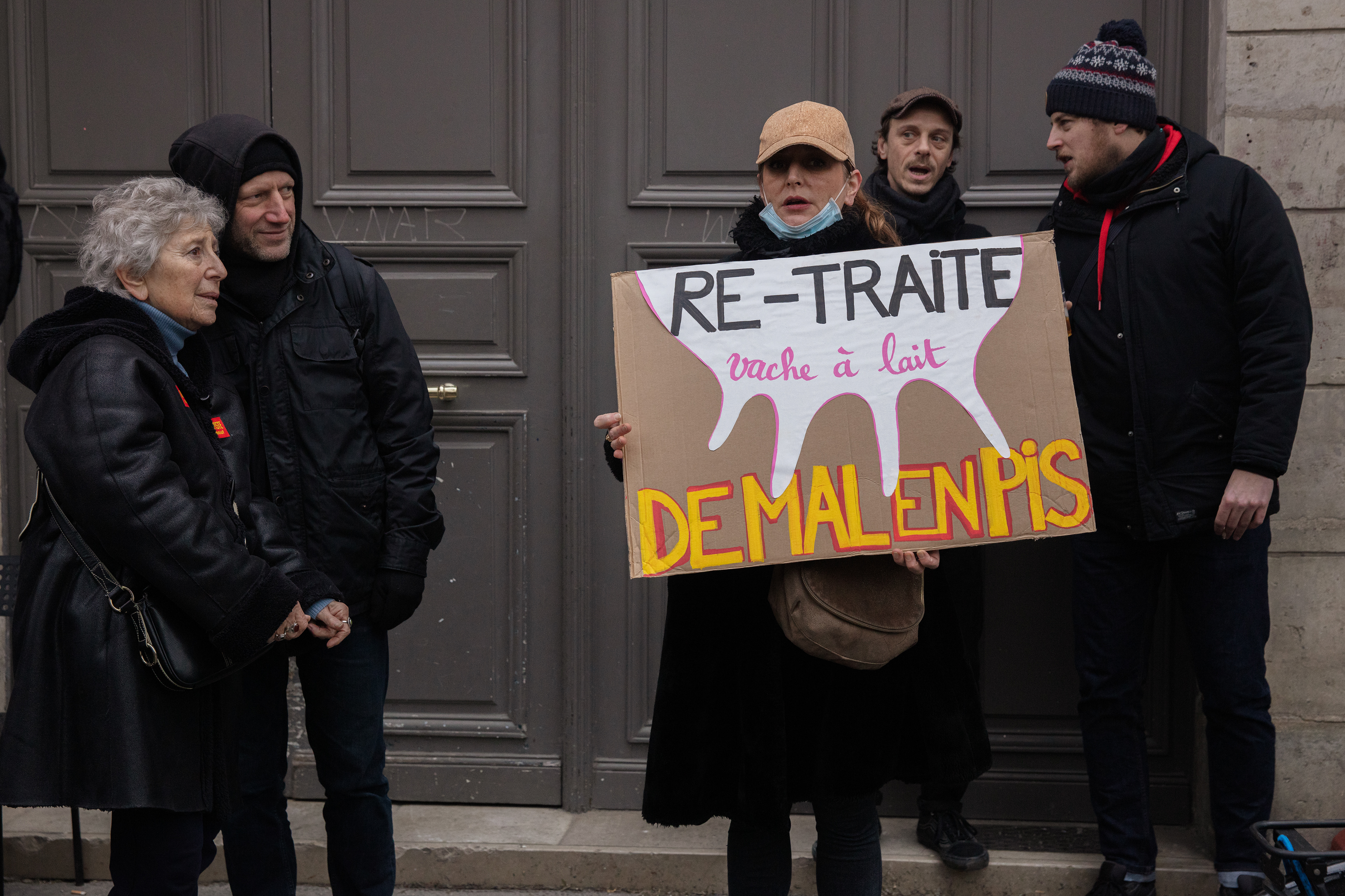 A French woman holds a placard in a protest against pension reforms in Paris, France, January 19th 2023.