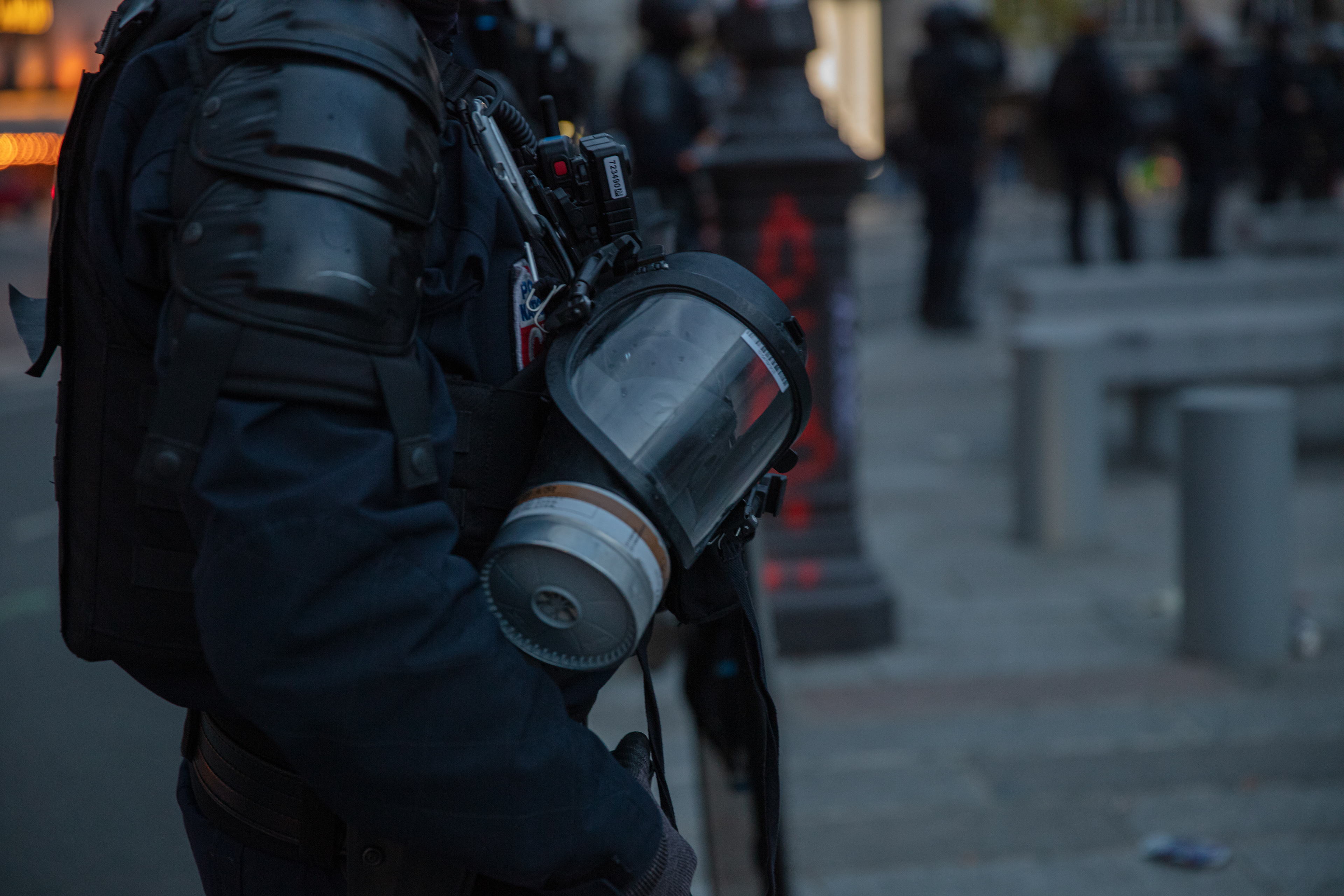 A policeman stands with its protective gear near Bastille, Paris, France on April 13th 2023.