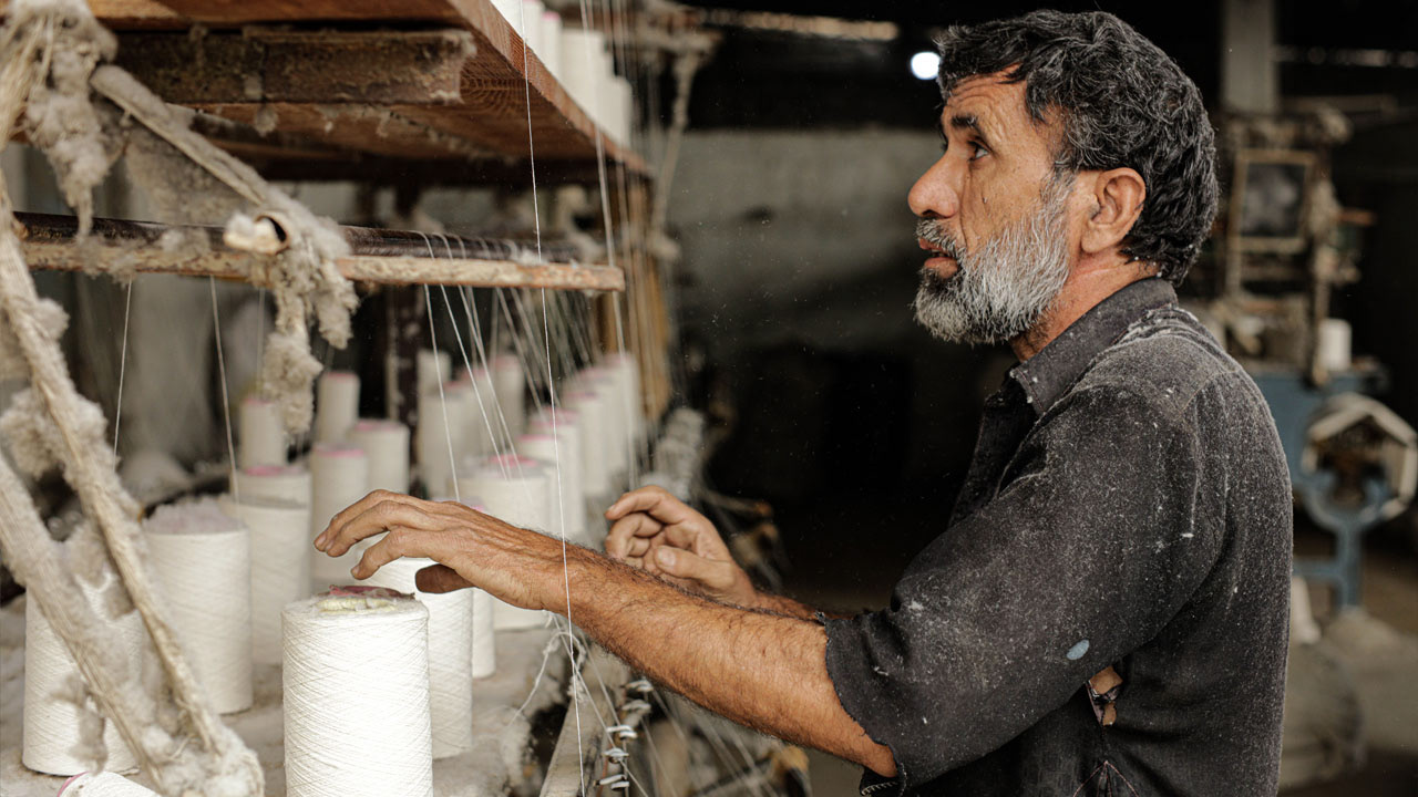Malik at a local textile manufacturing unit in North Nazimabad in Karachi, Pakistan.