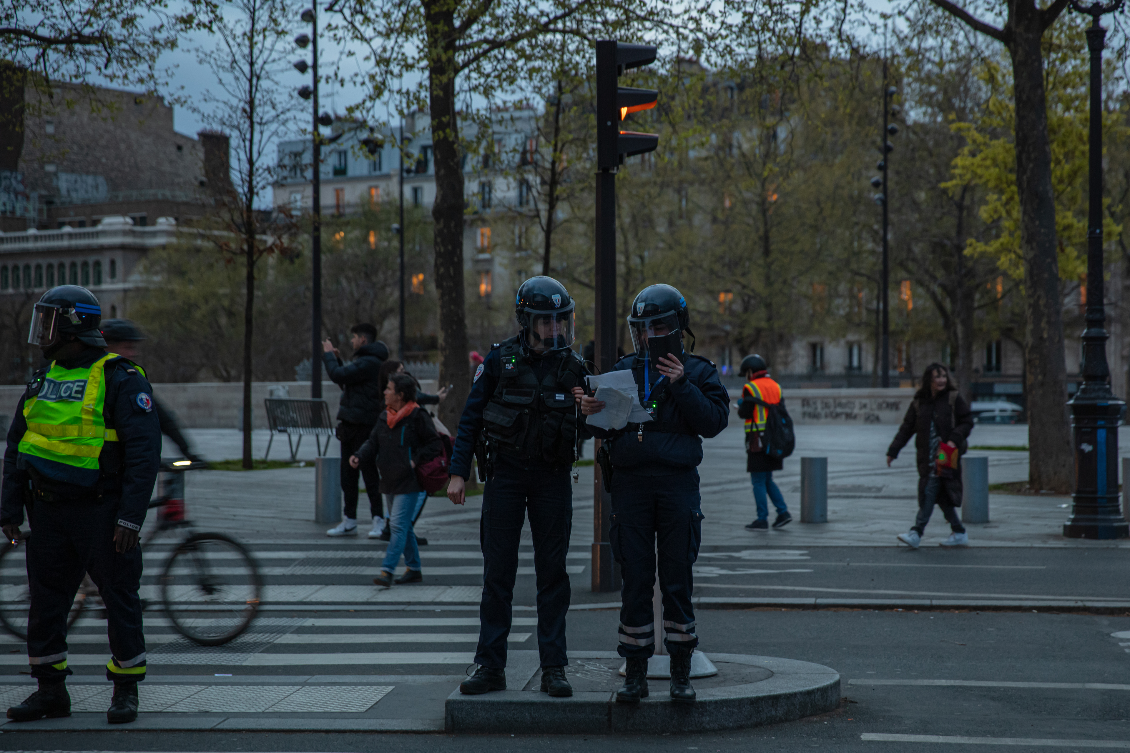 Two women police officers stands near Opéra Bastille, Paris, France, on April 13th 2023.