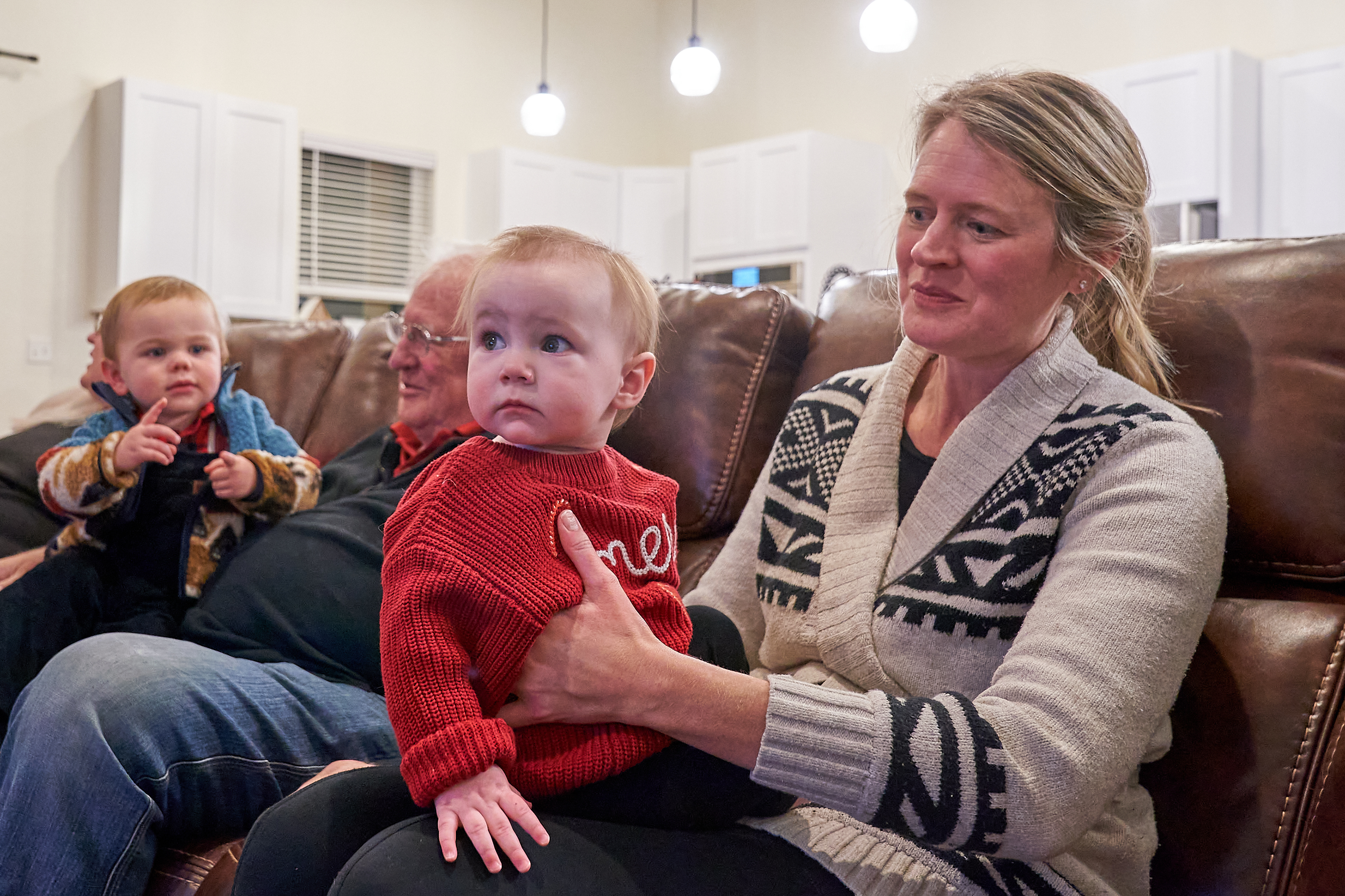 Trenton wondering if he likes Maeve on his Mom-mom's lap?