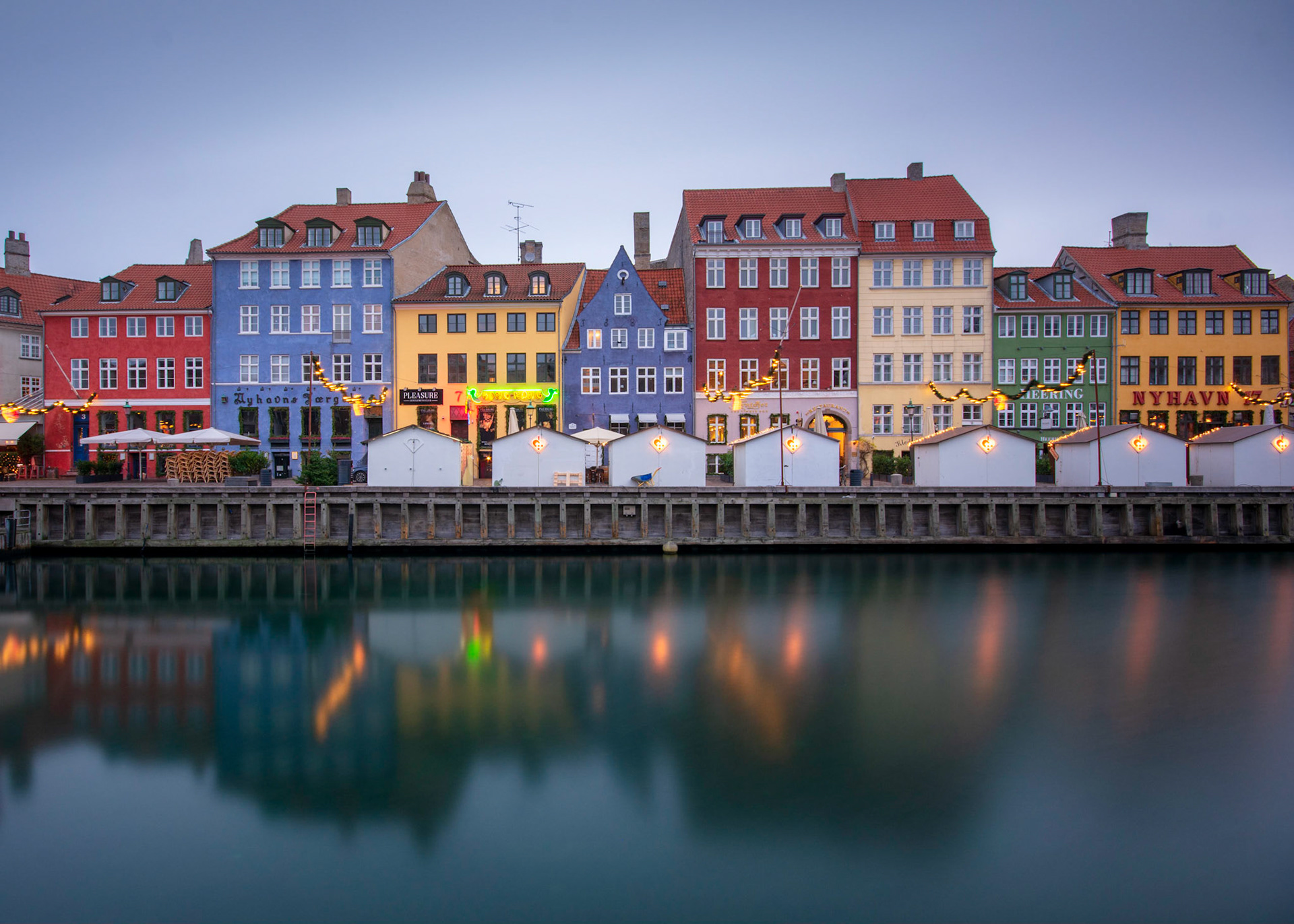 Nyhavn reflecting in smooth water