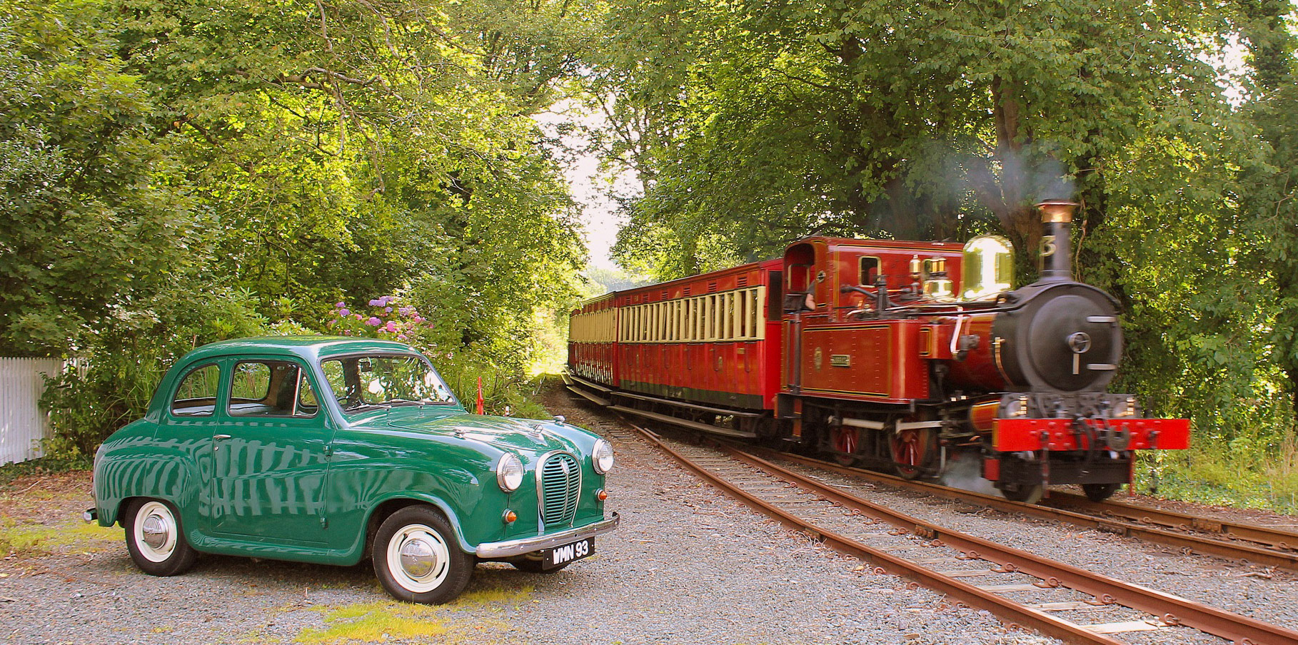 Bumble playing with trains
