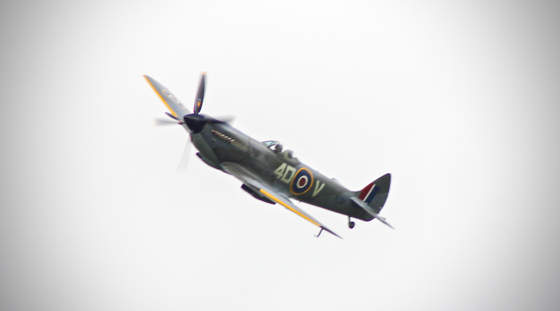 Spitfire flying past Wortley Hall in Leeds at the Austin A30-A35 International Rally 2015.