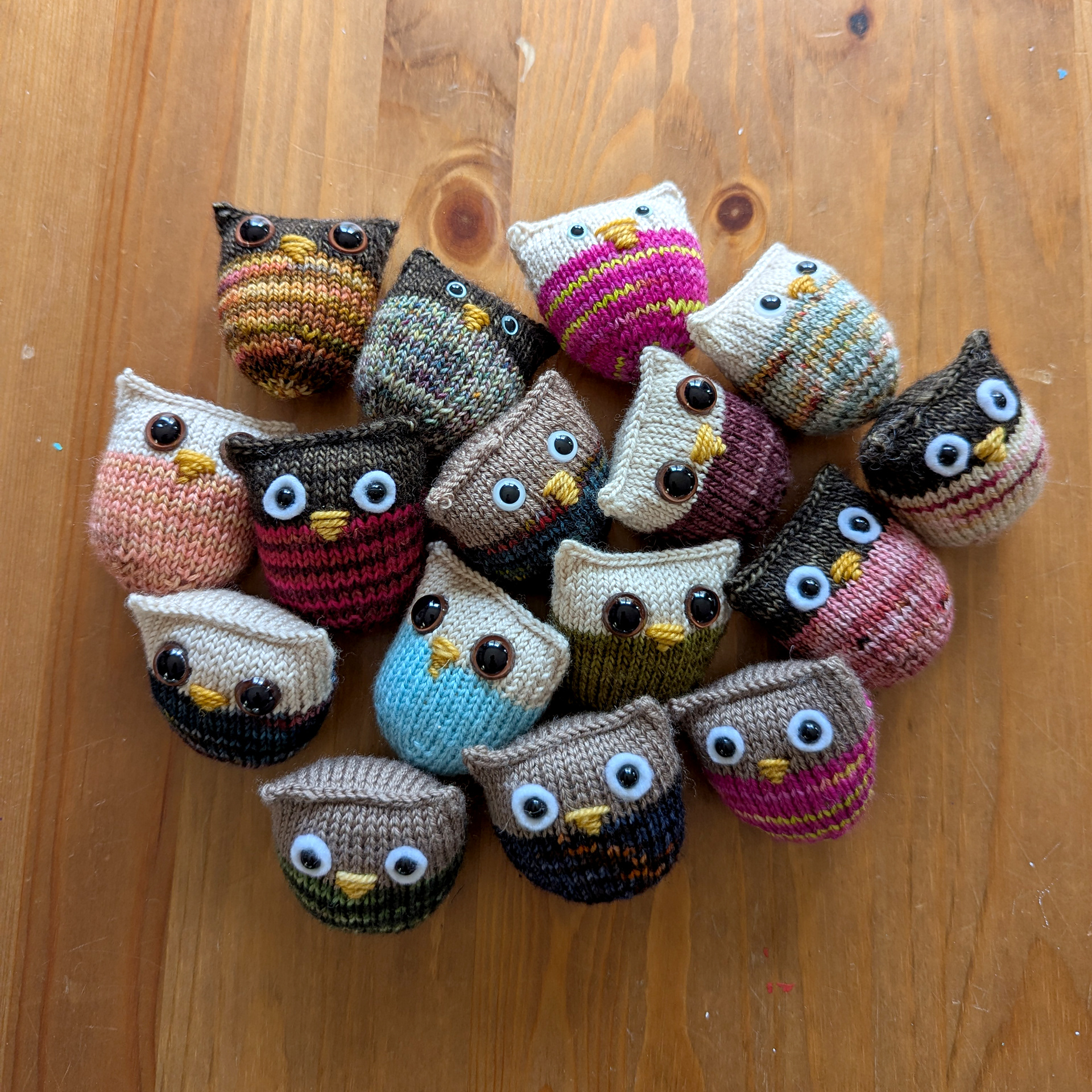 An array of little colourful owls