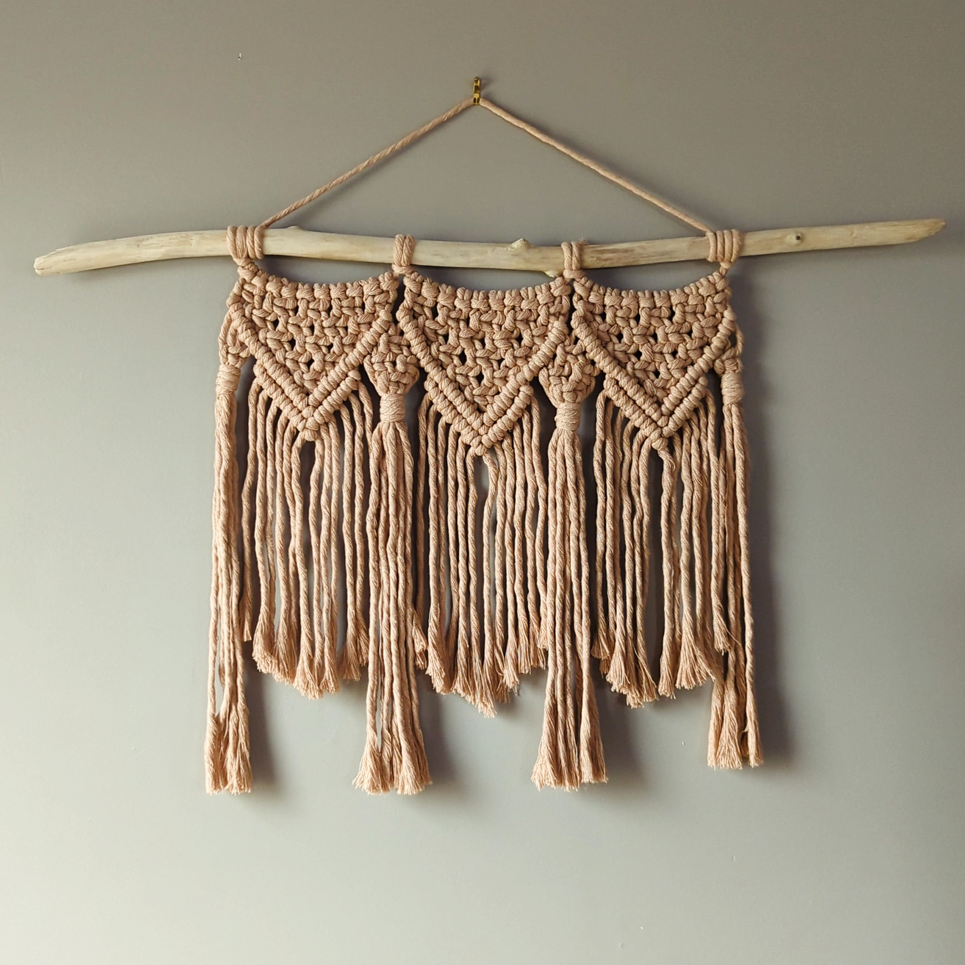 Peach wide macrame wall hanging 